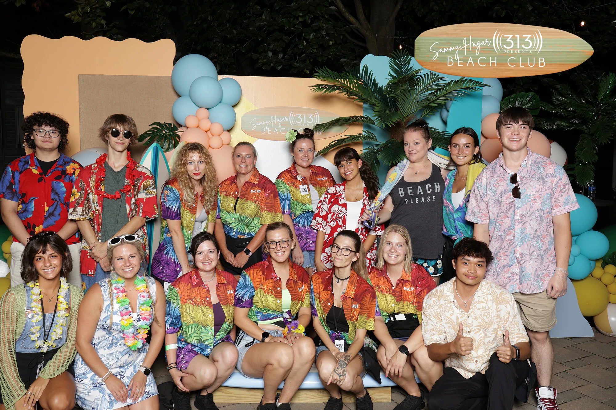The full crew in Hawaiian shirts across the Beach Club set at 313 Presents Concert Activations