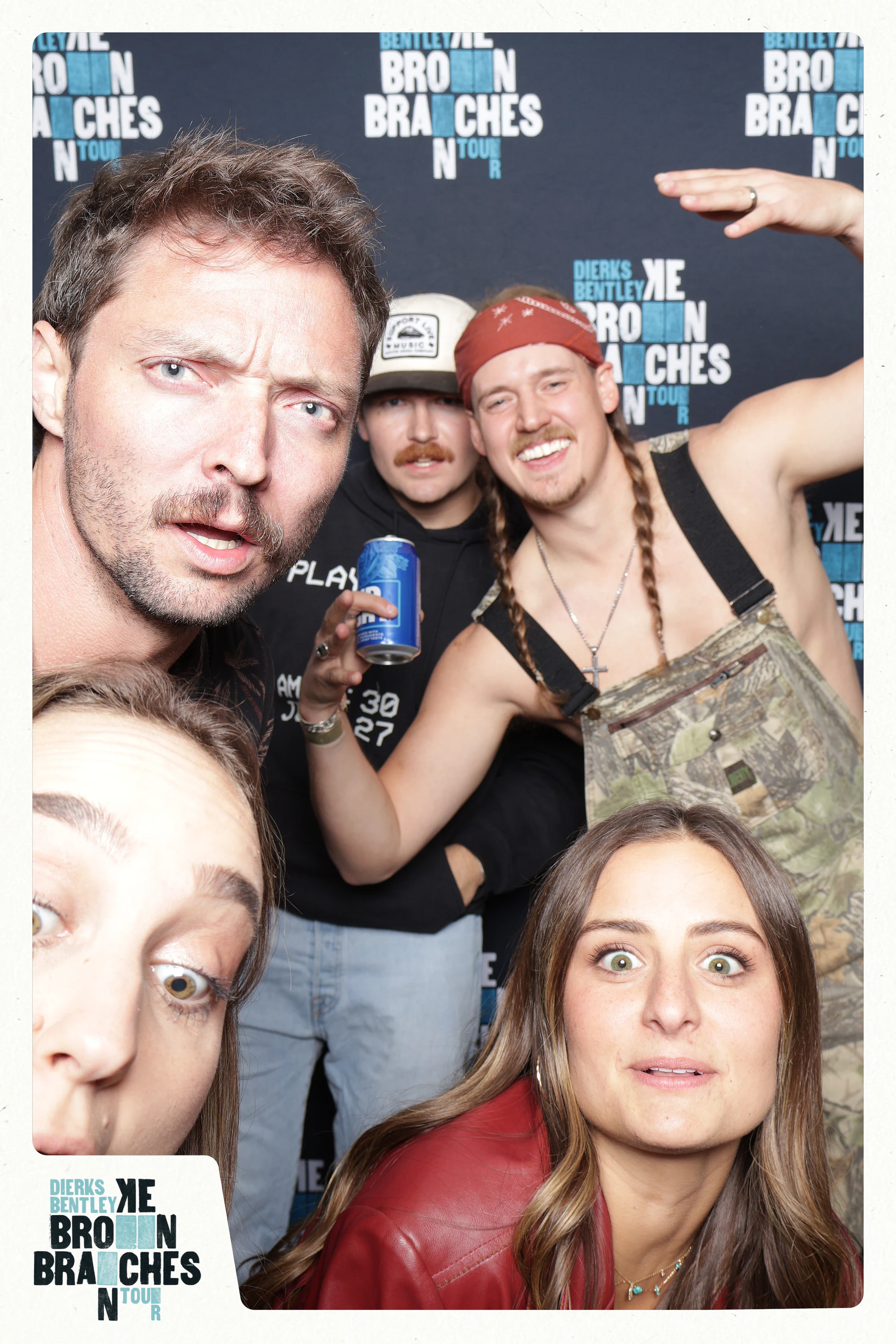 Five guests crowded right up to the lens, one holding a can at Dierks Bentley End of Tour Party