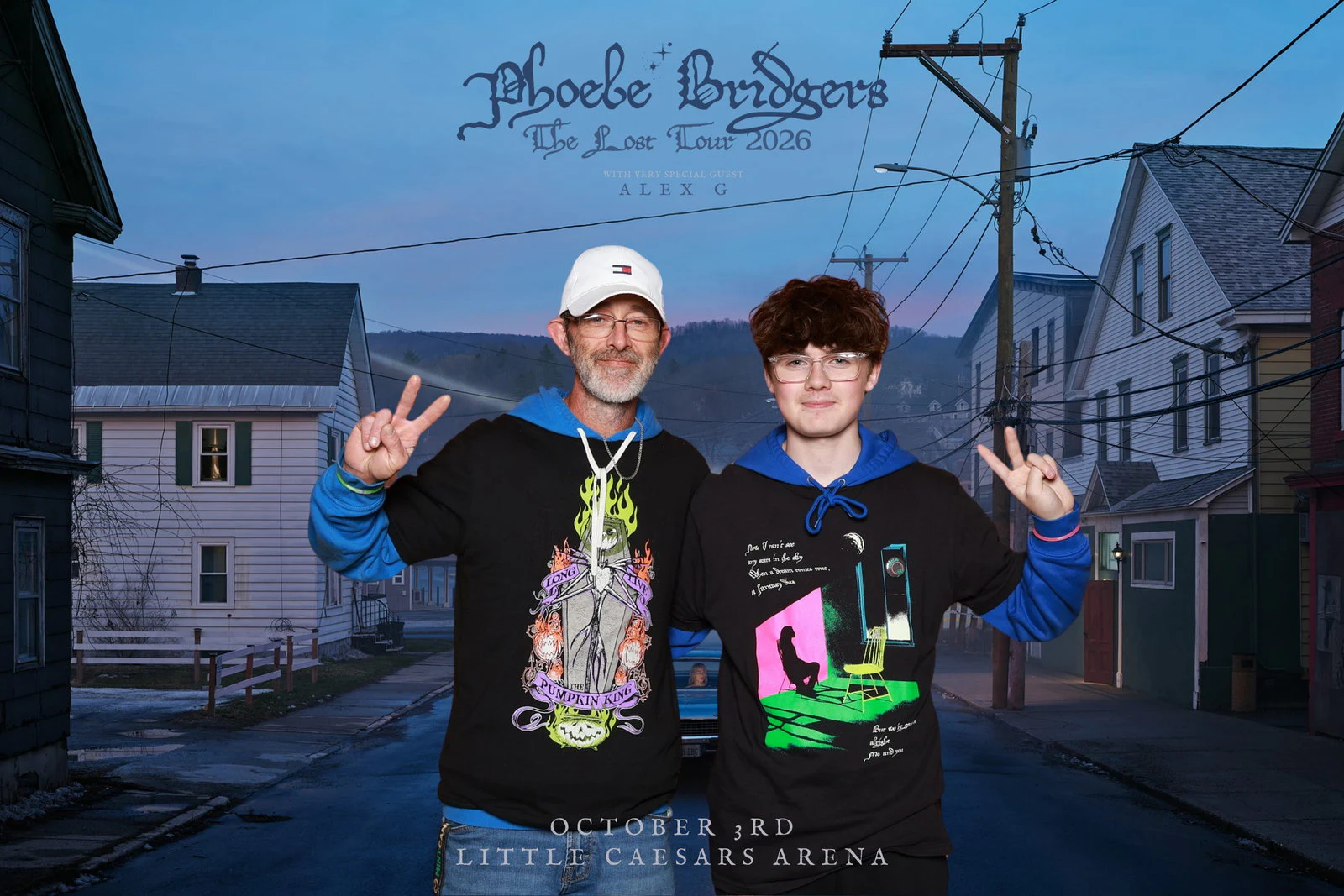 A man in a white cap and a teenager in glasses, both in black hoodies with peace signs up at Phoebe Bridgers with 313 Presents