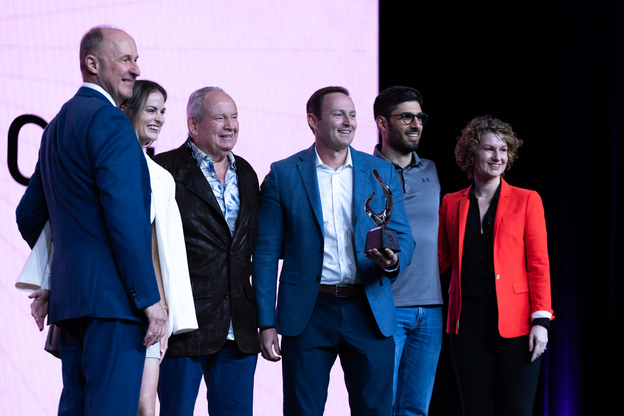 Five on stage with the award at Autodesk at the AGC Annual Convention 2023