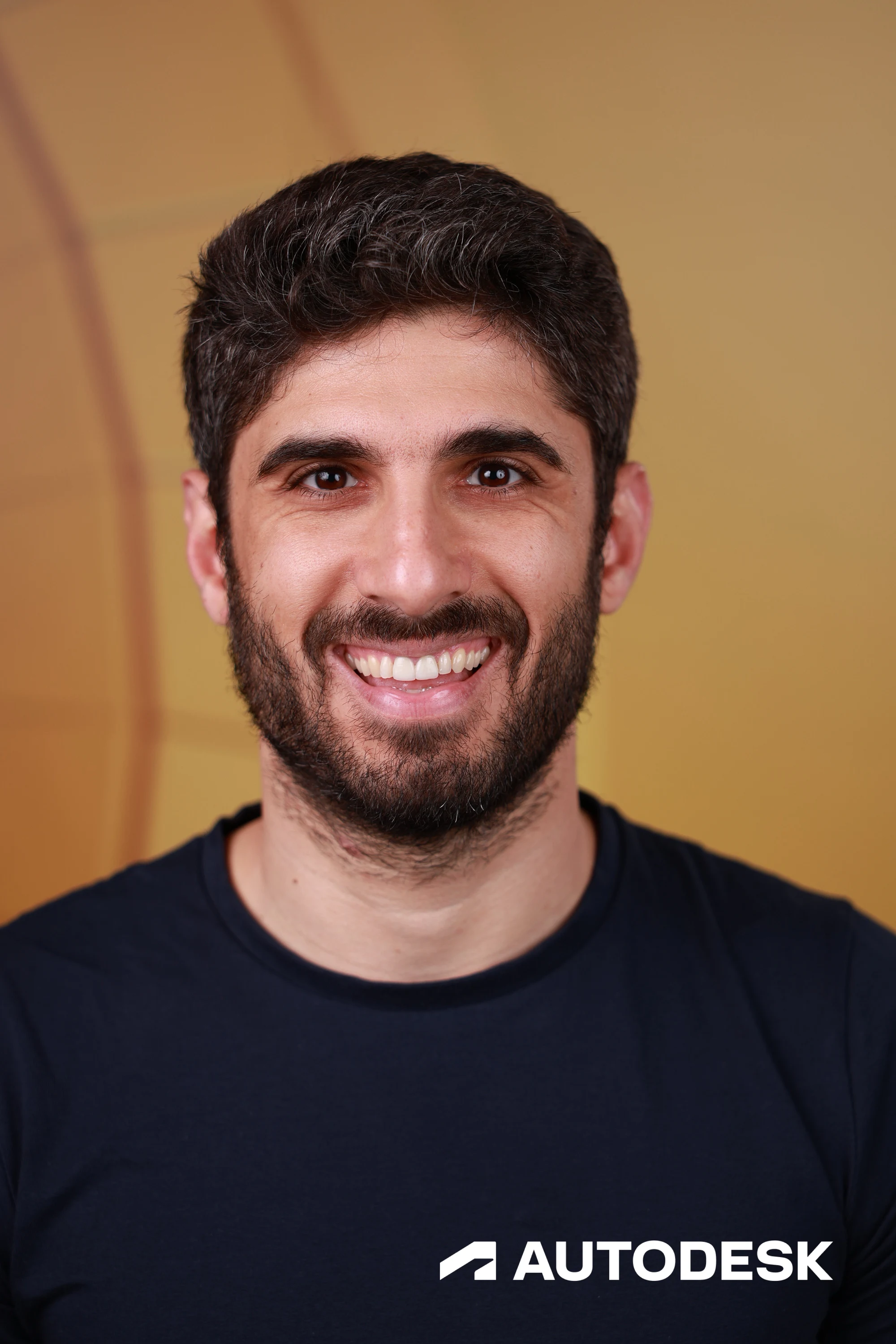A headshot of a guest in a navy tee at Autodesk at the AGC Annual Convention 2026