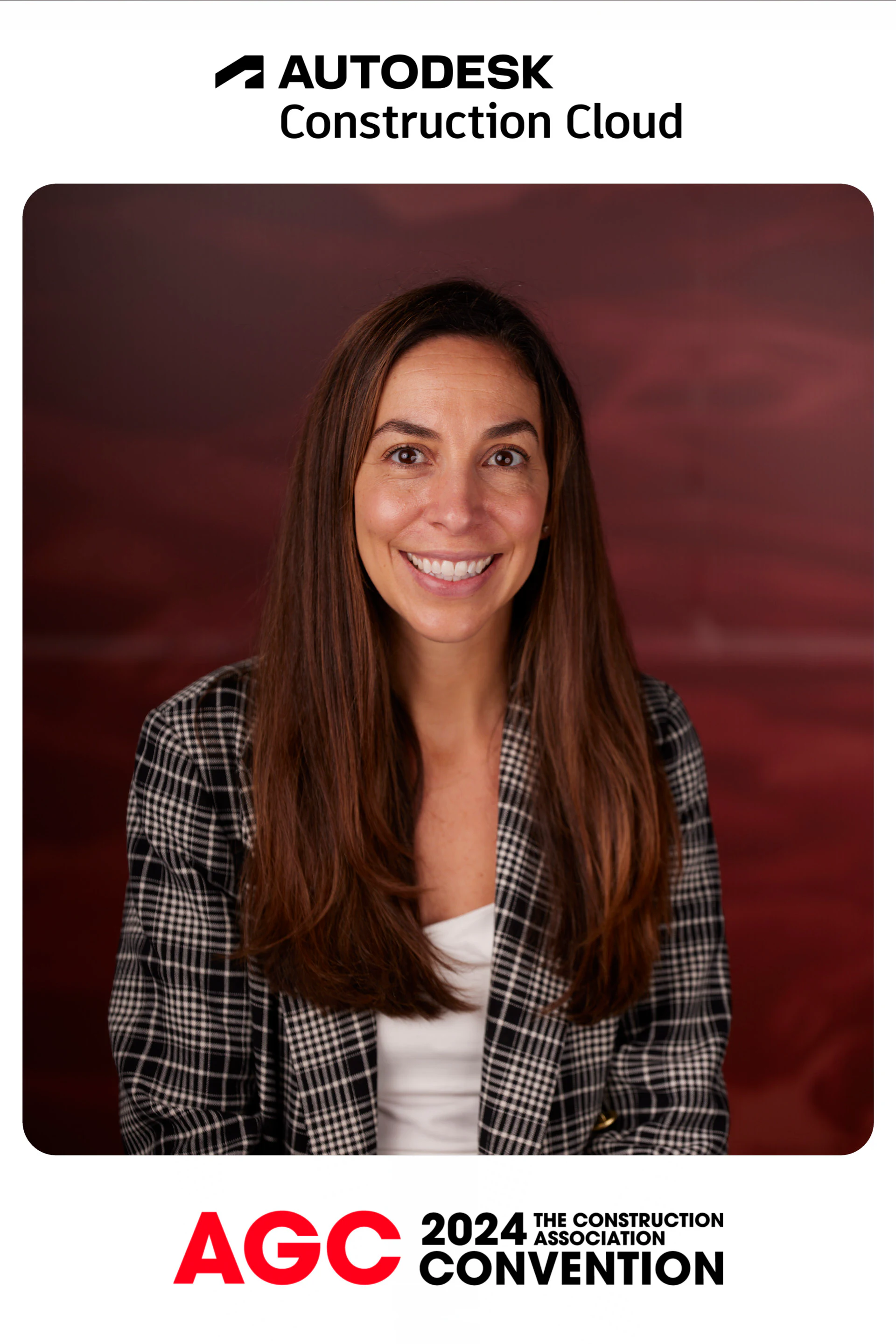 The guest in the plaid jacket smiling in a closer headshot at Autodesk at the AGC Annual Convention