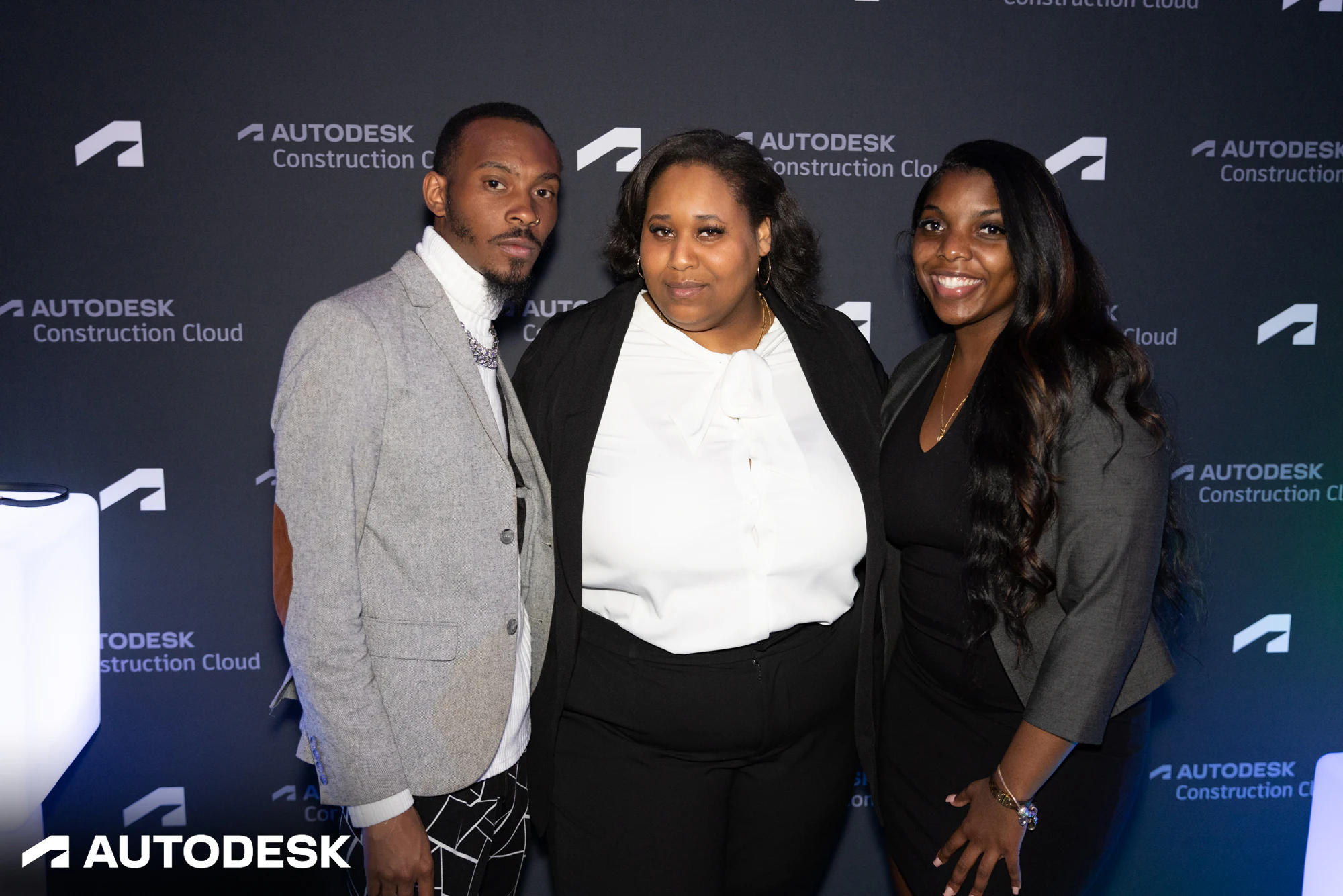 The three standing close, one more frame at Autodesk Awards Atlanta 2023