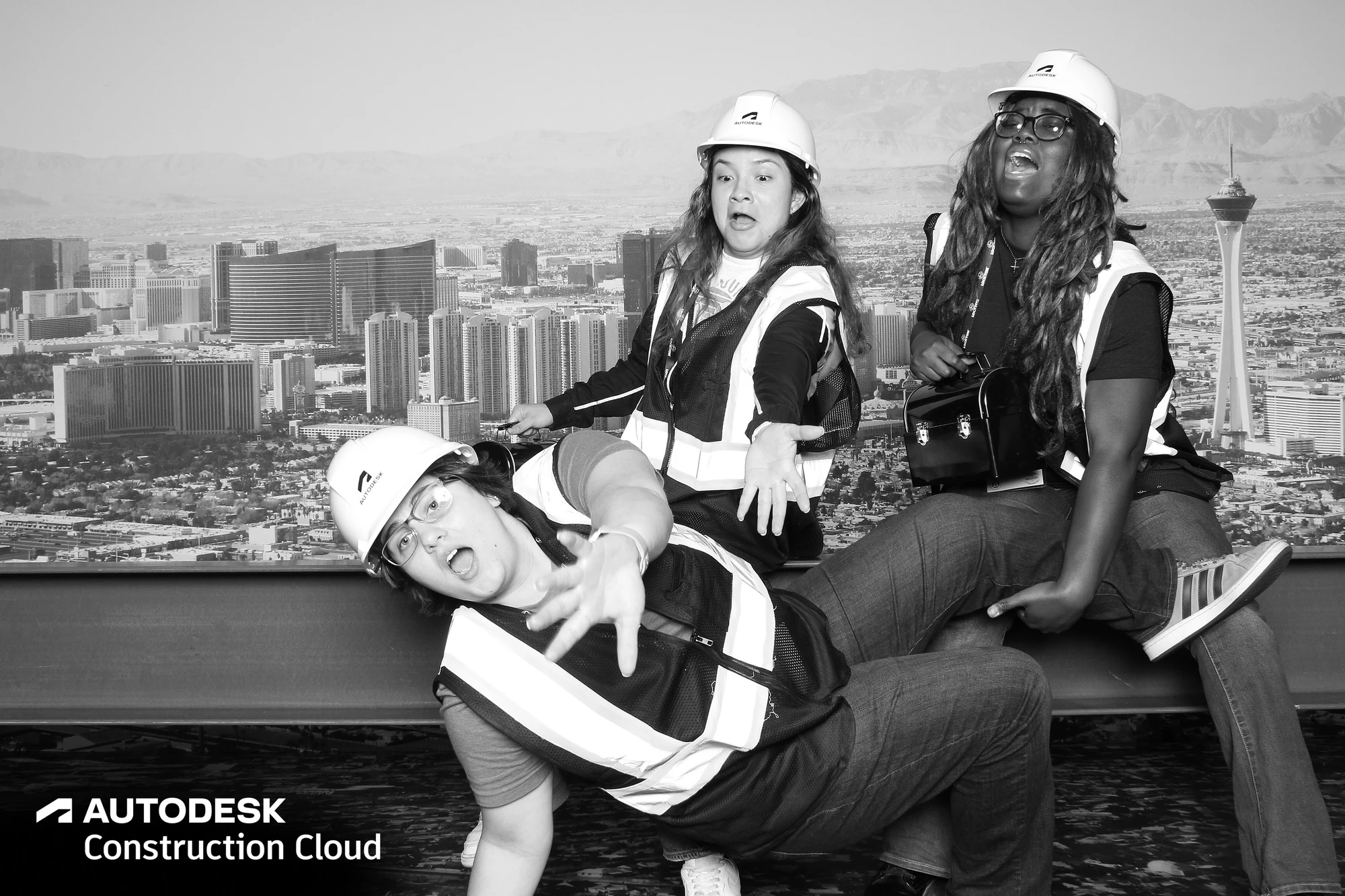 Trio with one laid back over the beam at Autodesk CONEXPO23