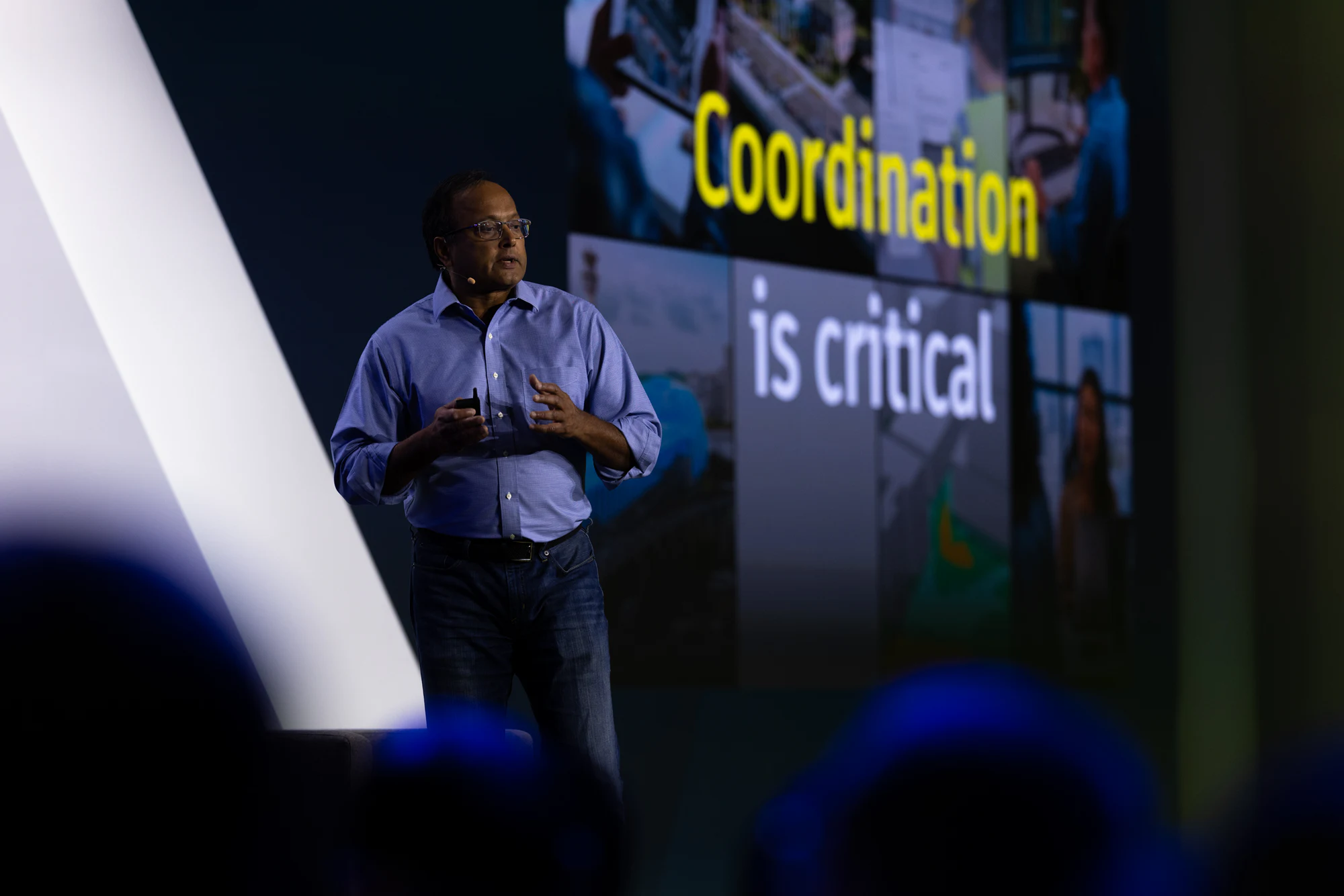 The keynote: the second speaker beside the slide “Coordination is critical” at Autodesk at CONEXPO-CON/AGG 2026