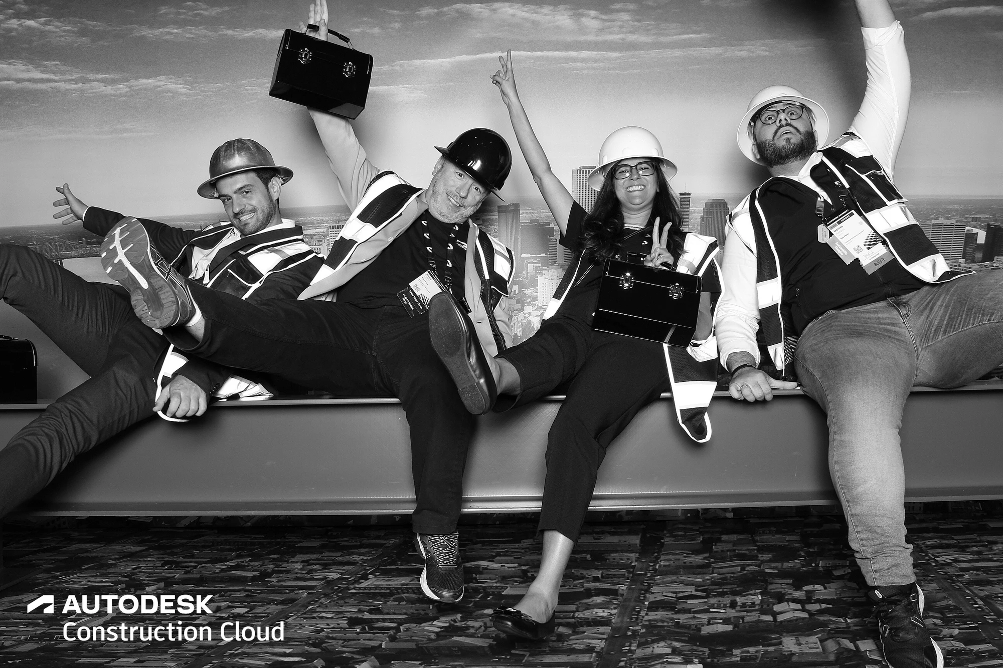 Four leaning back with legs everywhere at Autodesk University 2022