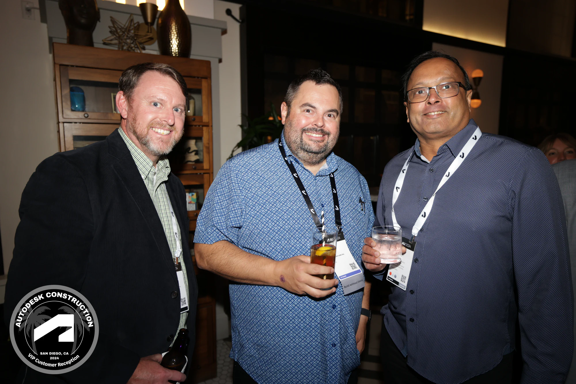 VIP reception: the three guests smiling, a closer frame at Autodesk University 2024