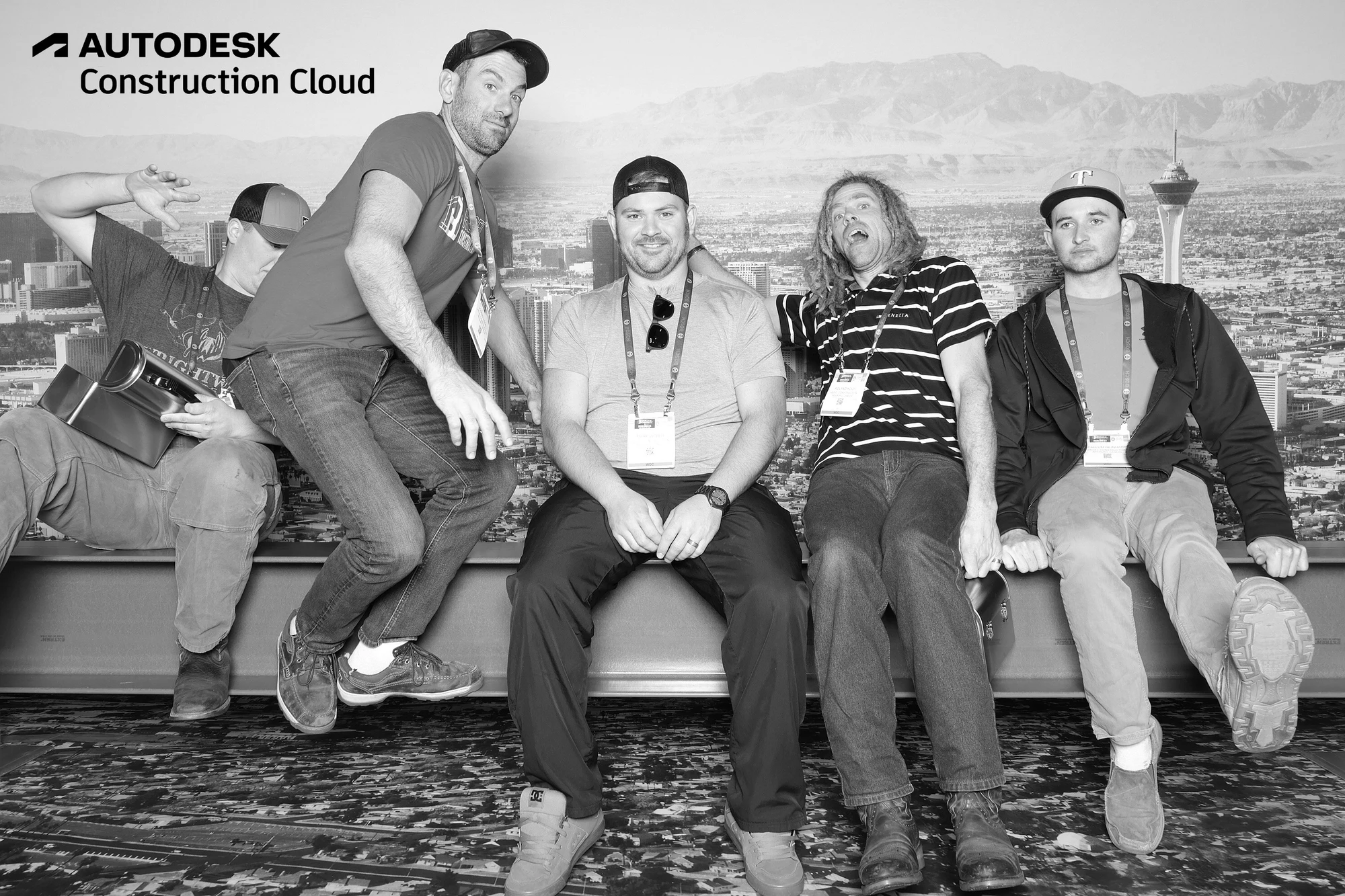 One guest jumping up from the beam while the others sit at Autodesk at World of Concrete 2025