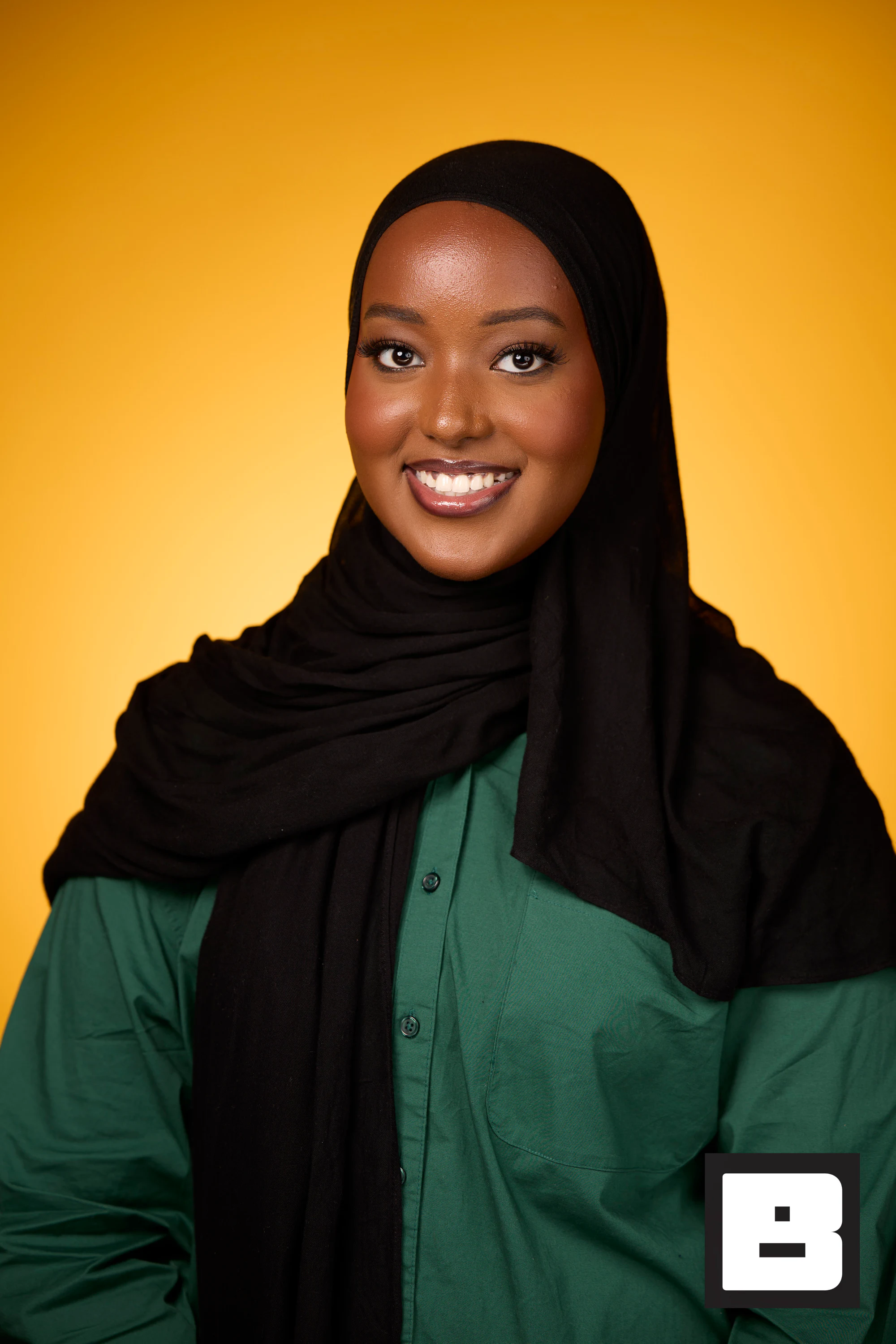 A headshot of a guest in a black hijab and a green shirt at Black Tech Week 2025