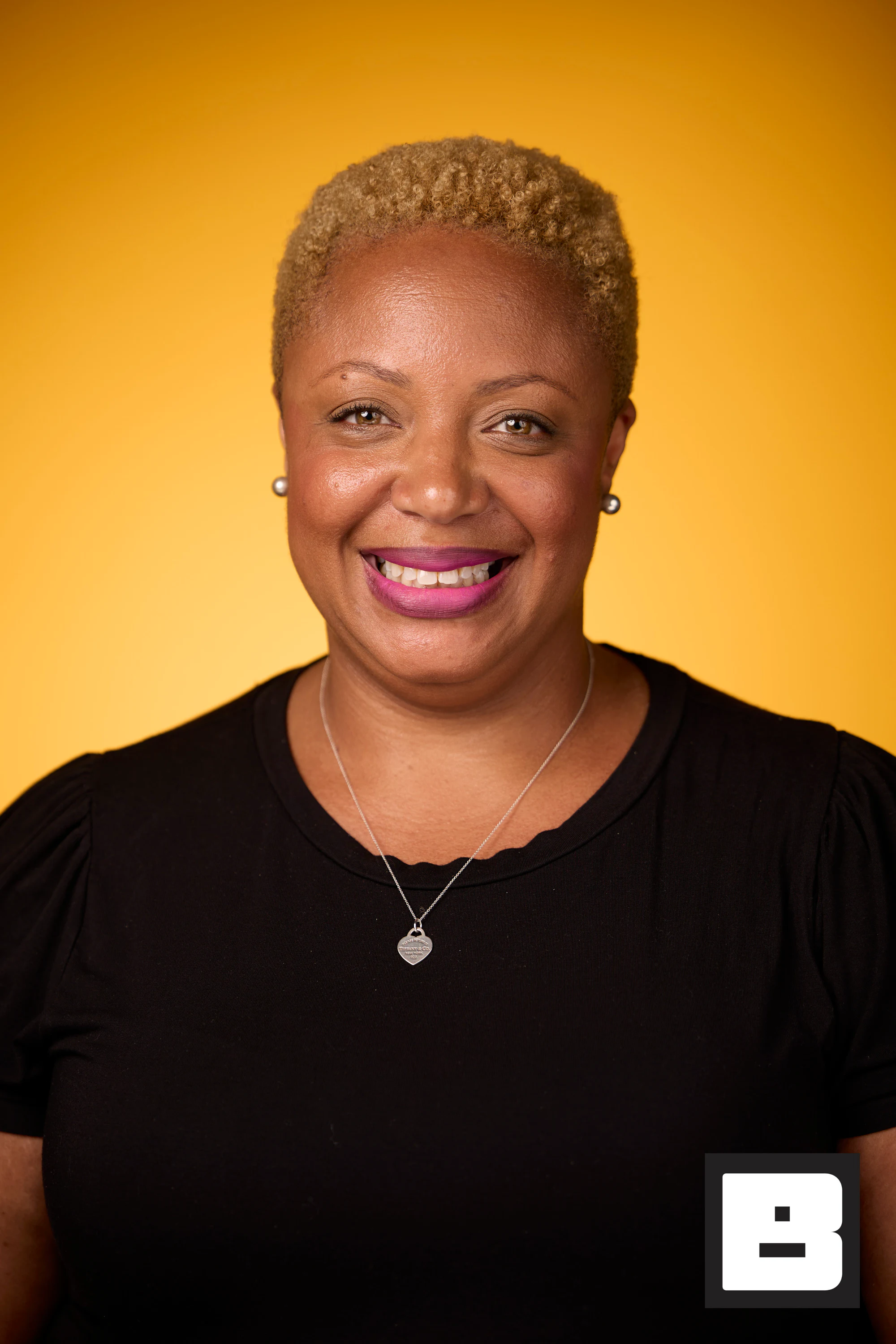 Cropped blonde hair, warm laugh at P&G Confidence Lab at Black Tech Week