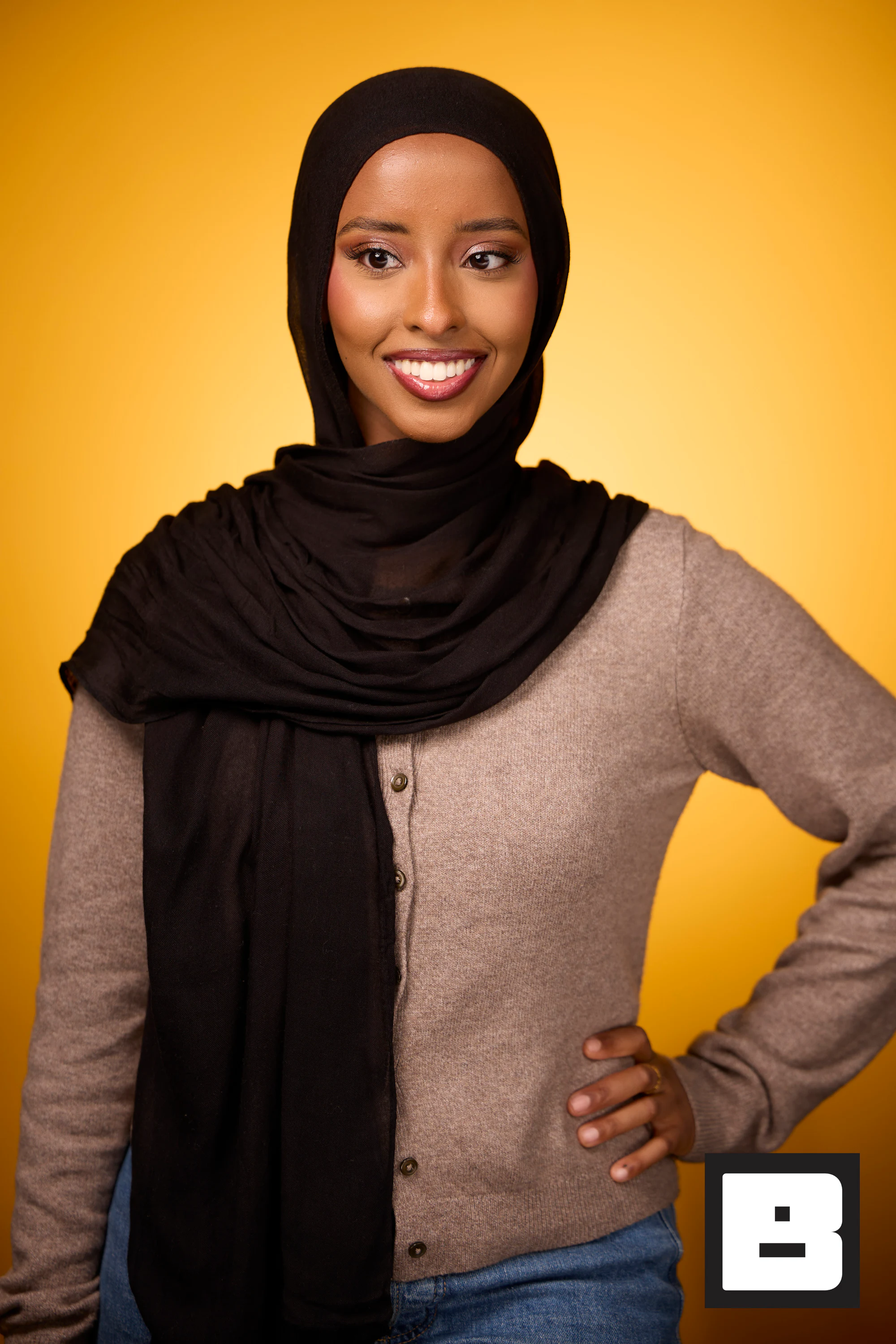 Hijab and cardigan, hand on hip at P&G Confidence Lab at Black Tech Week