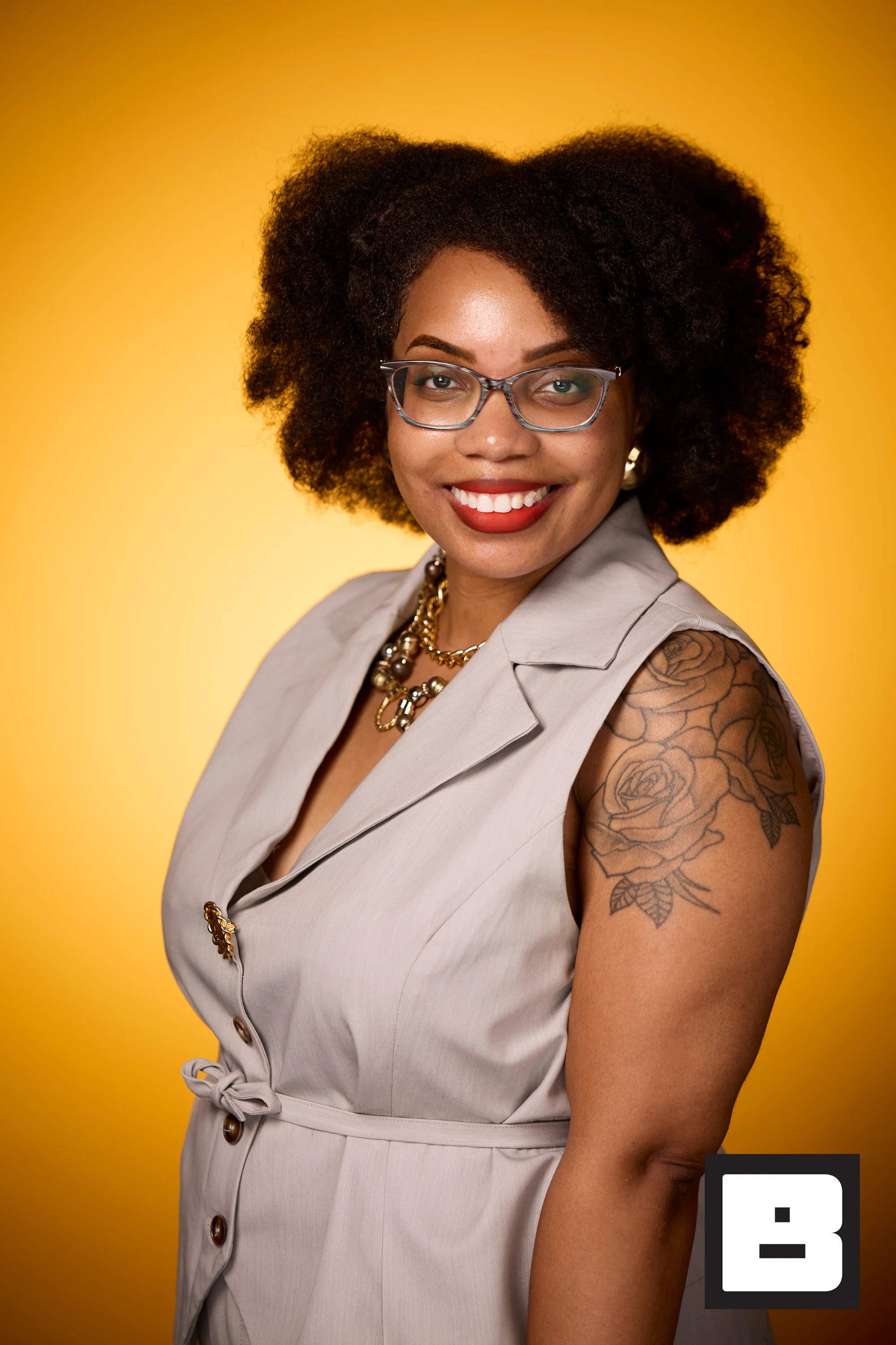 Gray wrap dress and natural fro at P&G Confidence Lab at Black Tech Week