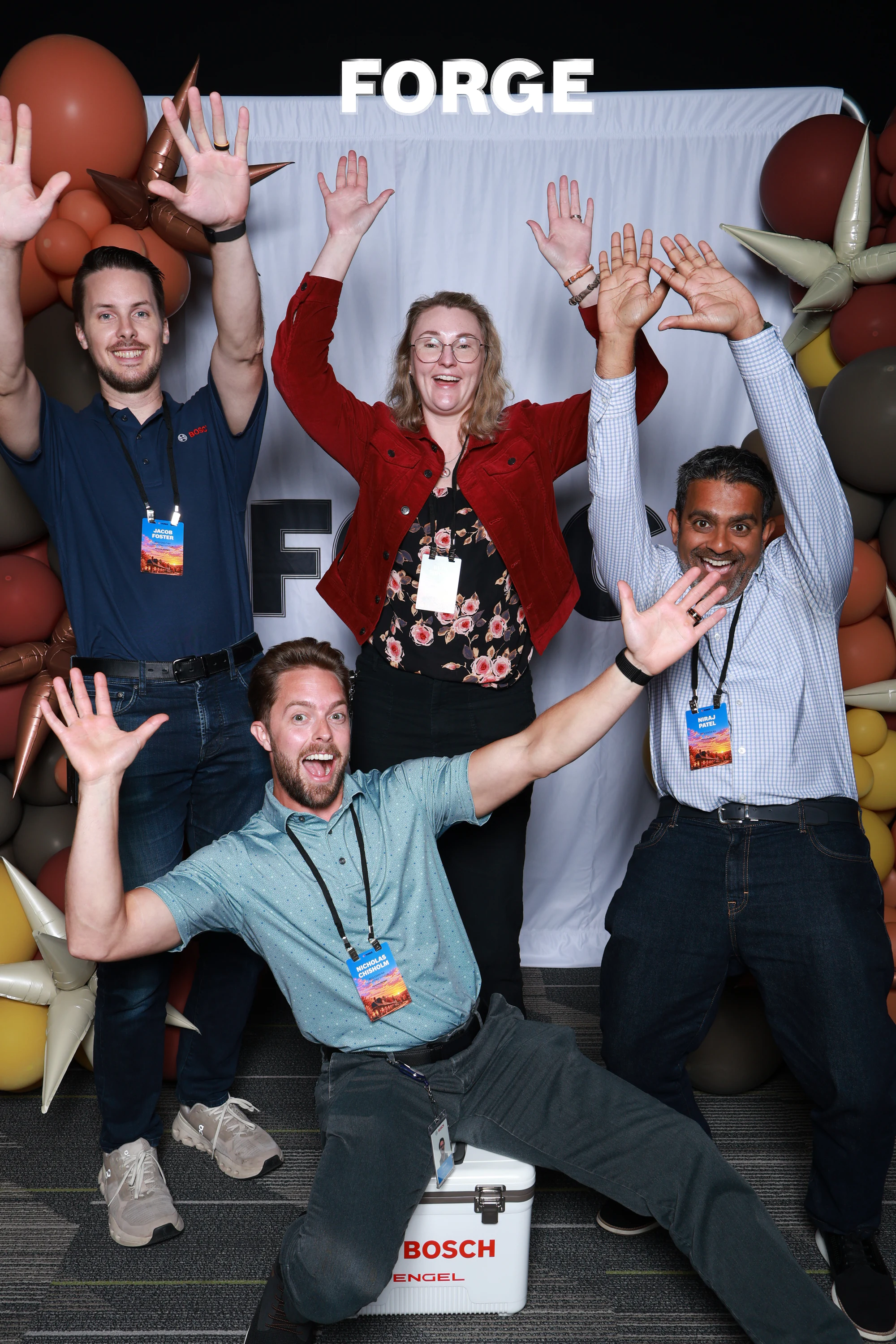 All four throwing their arms in the air at Bosch FORGE 2026