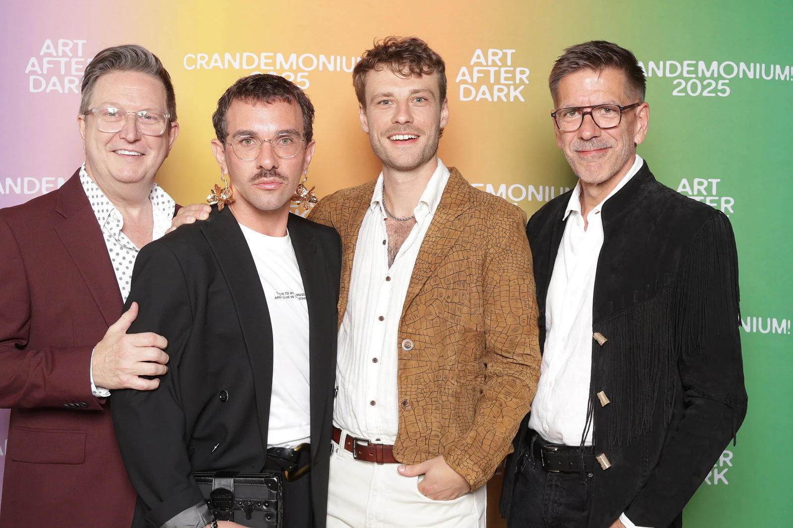 The four men once more, the one in a maroon jacket on the left at Crandemonium 2025