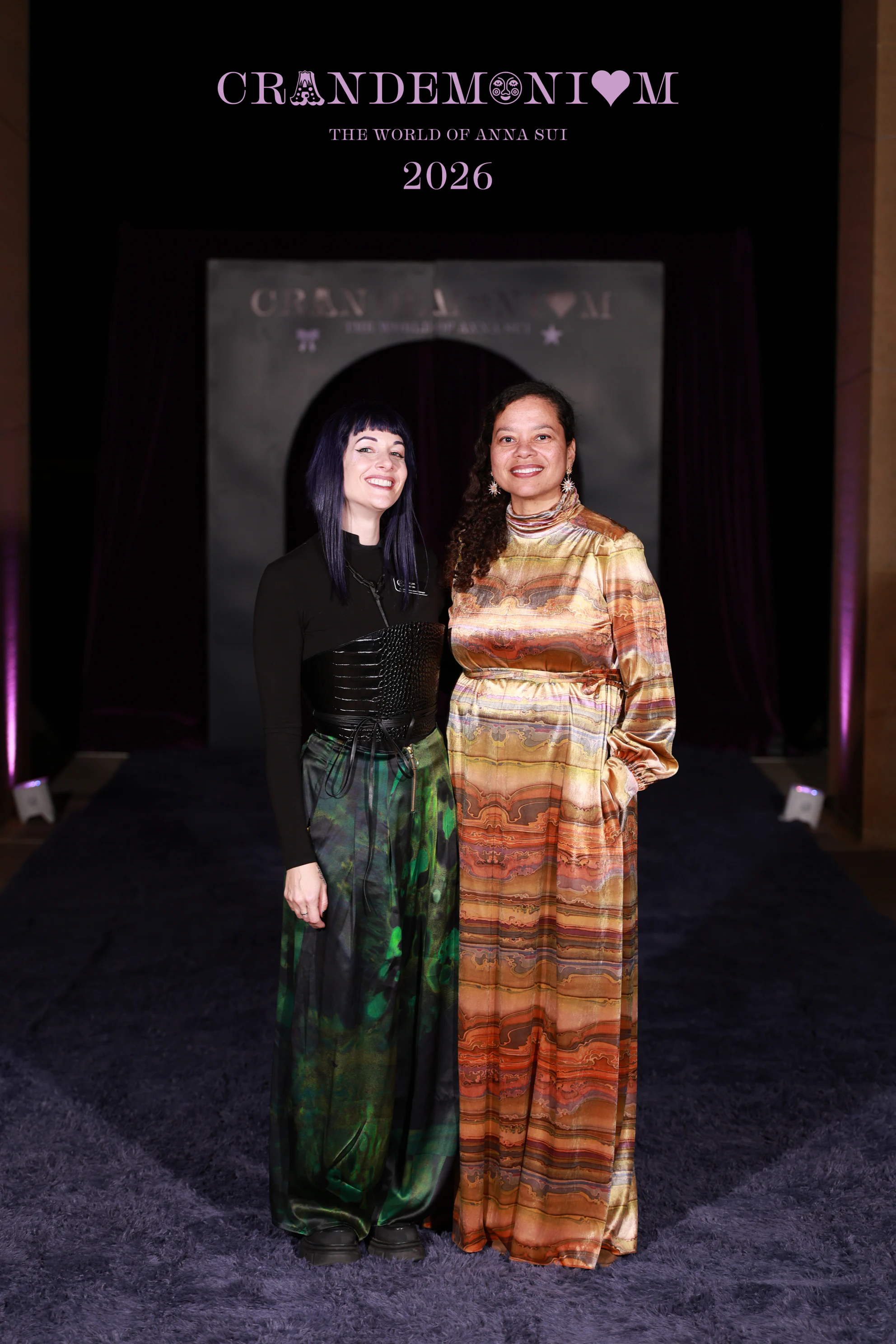 The two women standing close, both smiling at Crandemonium 2026