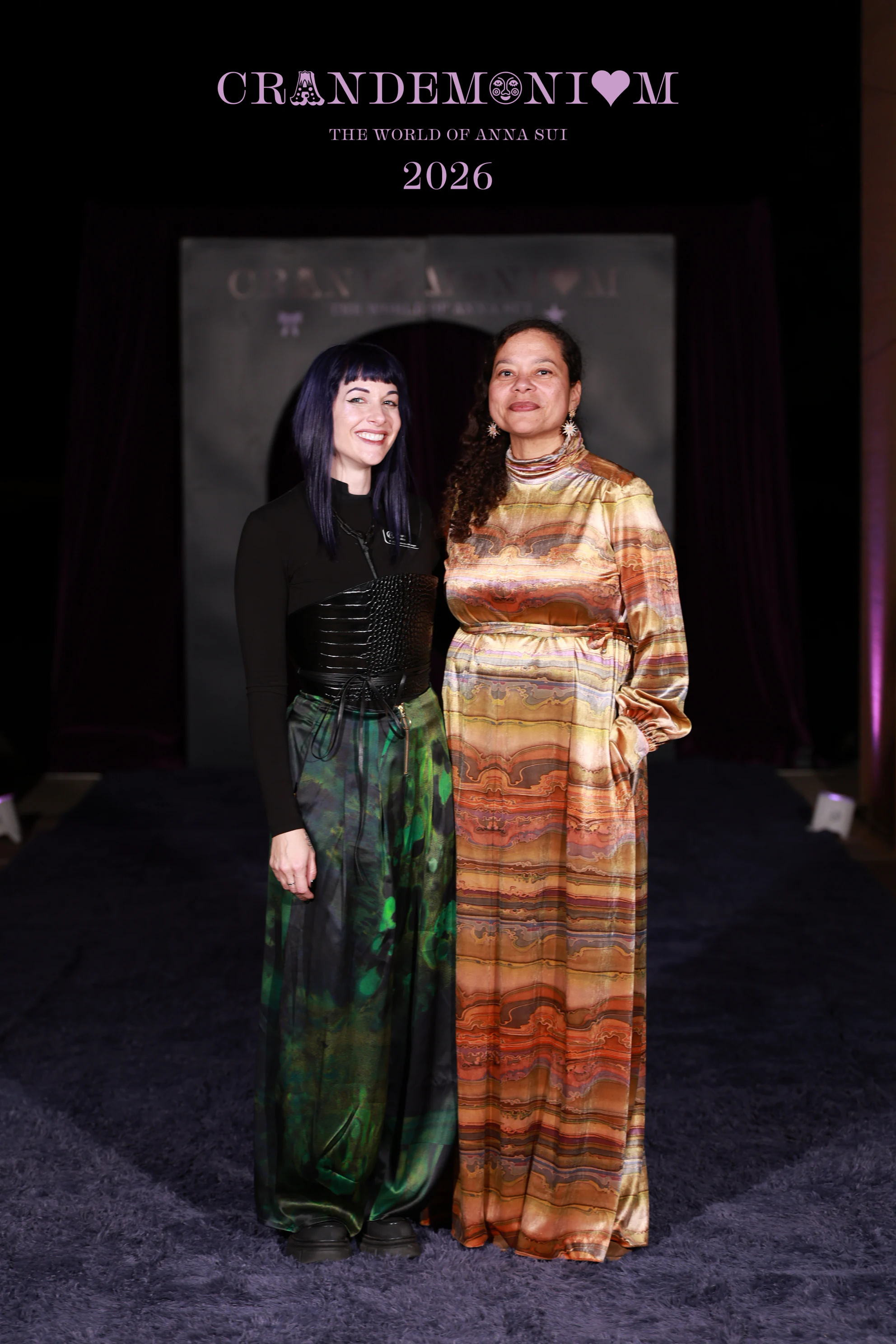The two women side by side in front of the arch at Crandemonium 2026