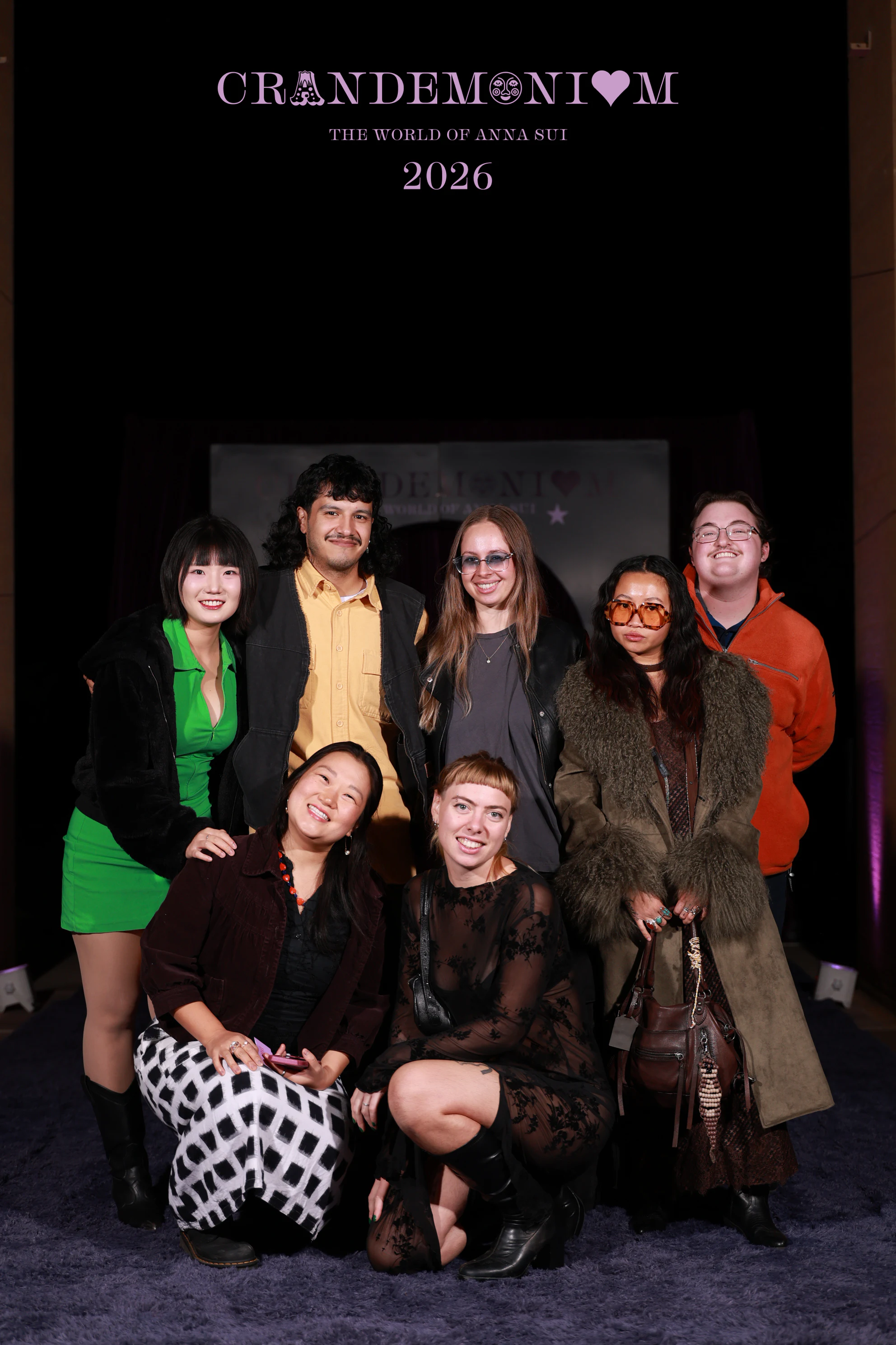 The nine guests together, the front row kneeling at Crandemonium 2026