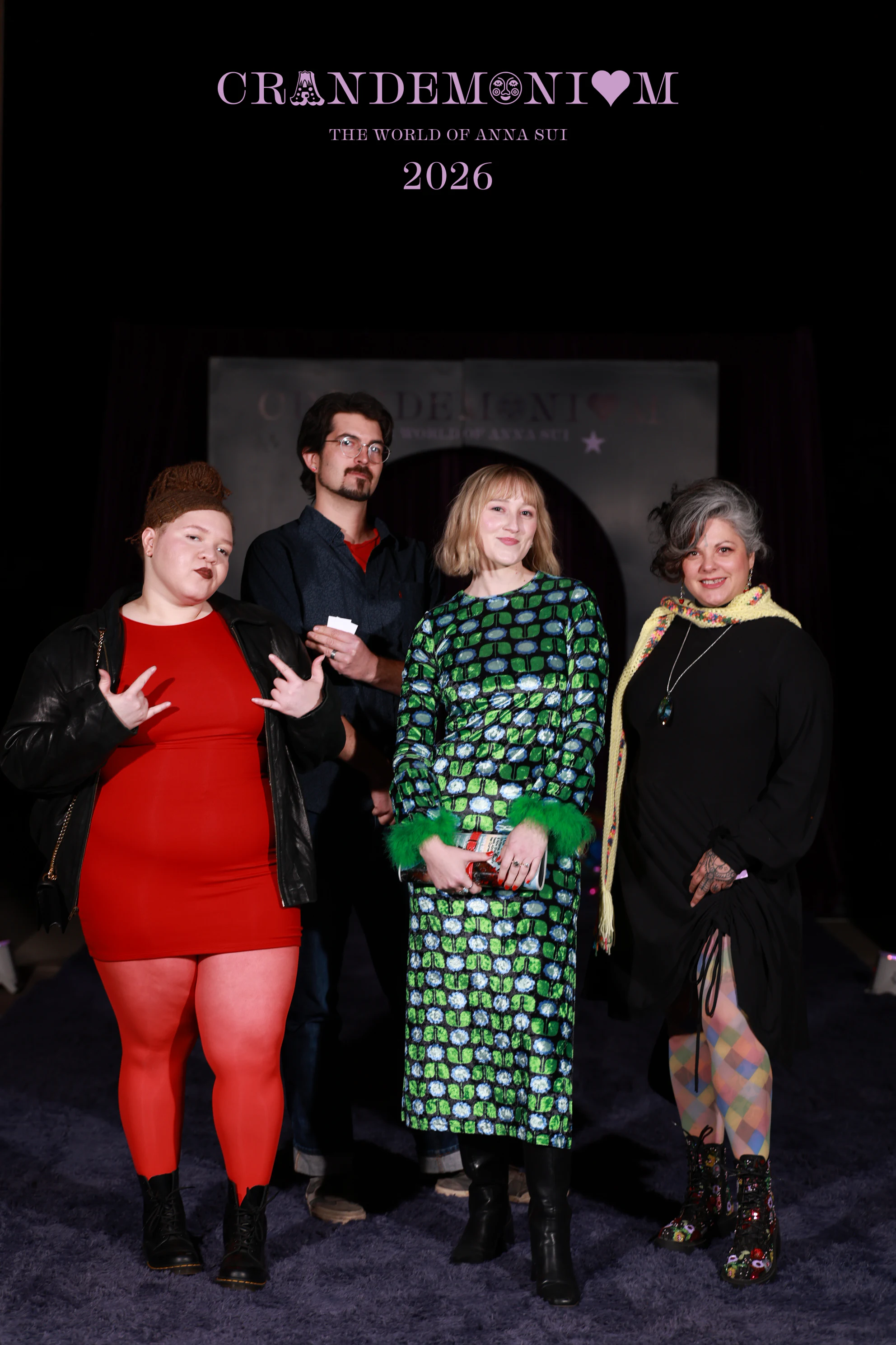 The four guests leaning in, heads tilted at Crandemonium 2026