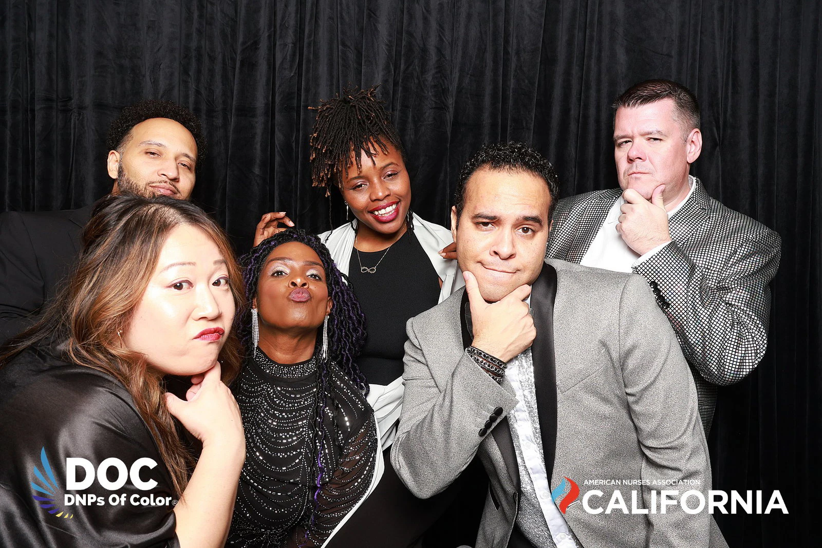 The seven guests pulling faces, hands on chins at DNPs of Color