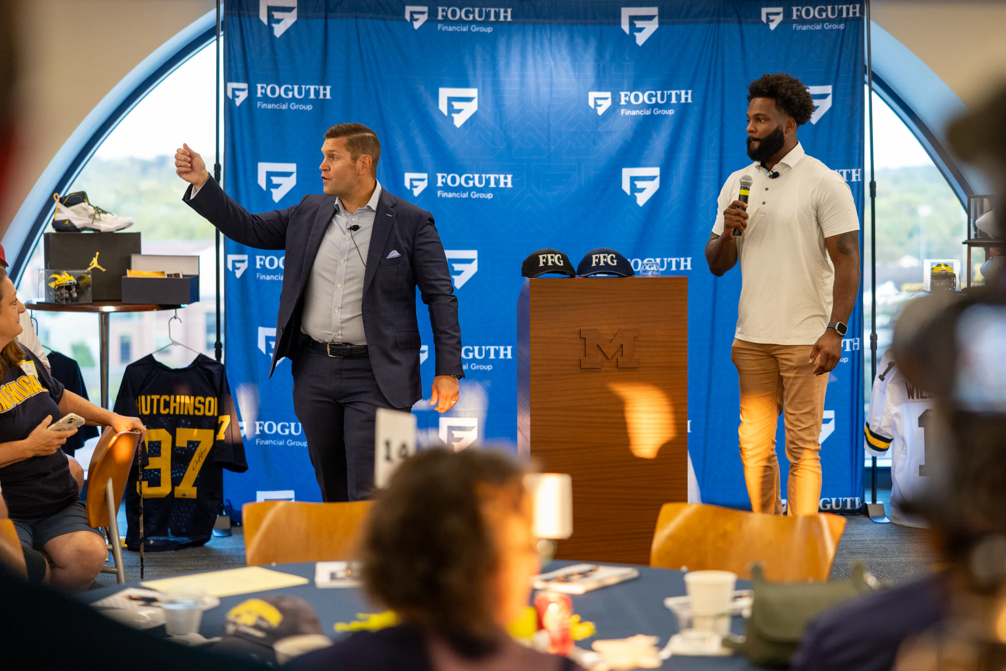 Speaker at the jersey table at Foguth Financial at The Big House