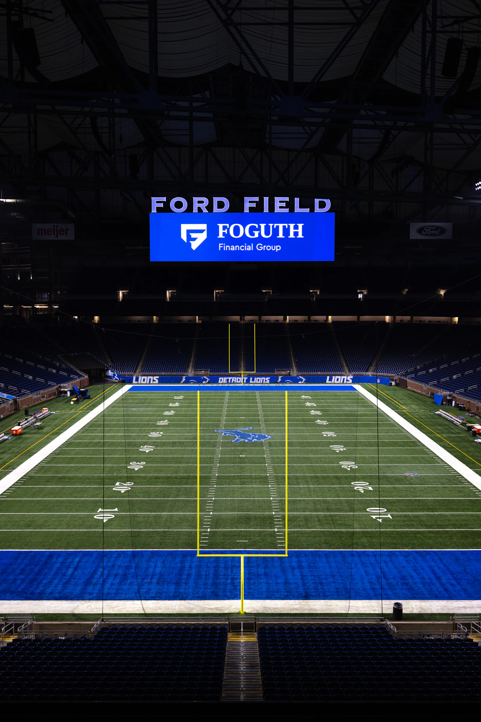 The branded board stacked over the full field at Foguth Financial at Ford Field