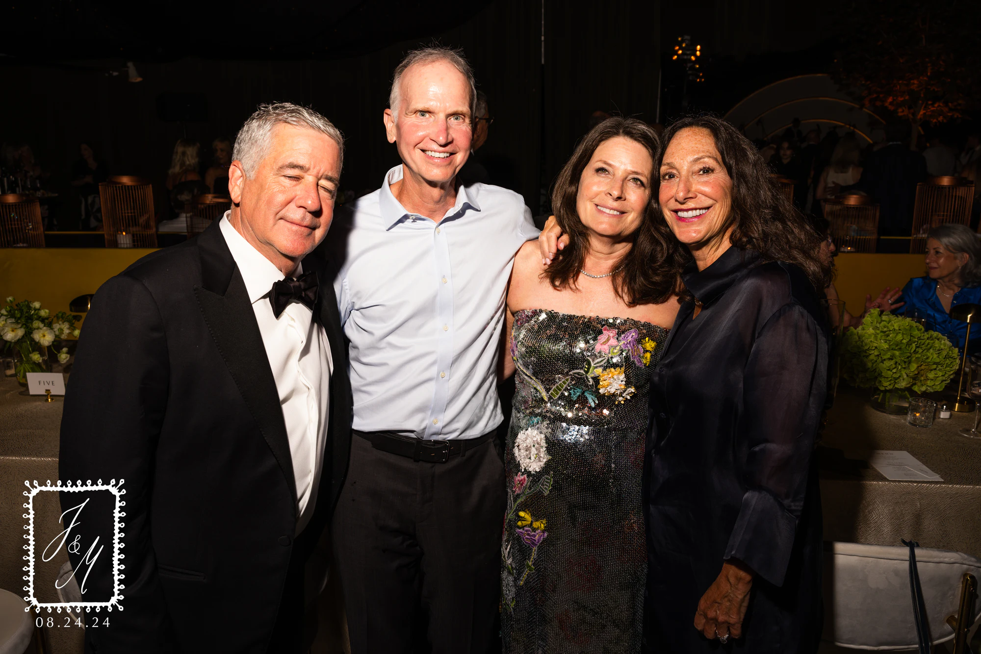 Four guests, one in a sequined floral gown, two in black tie at Jaclyn + Michael at Franklin Hills Country Club