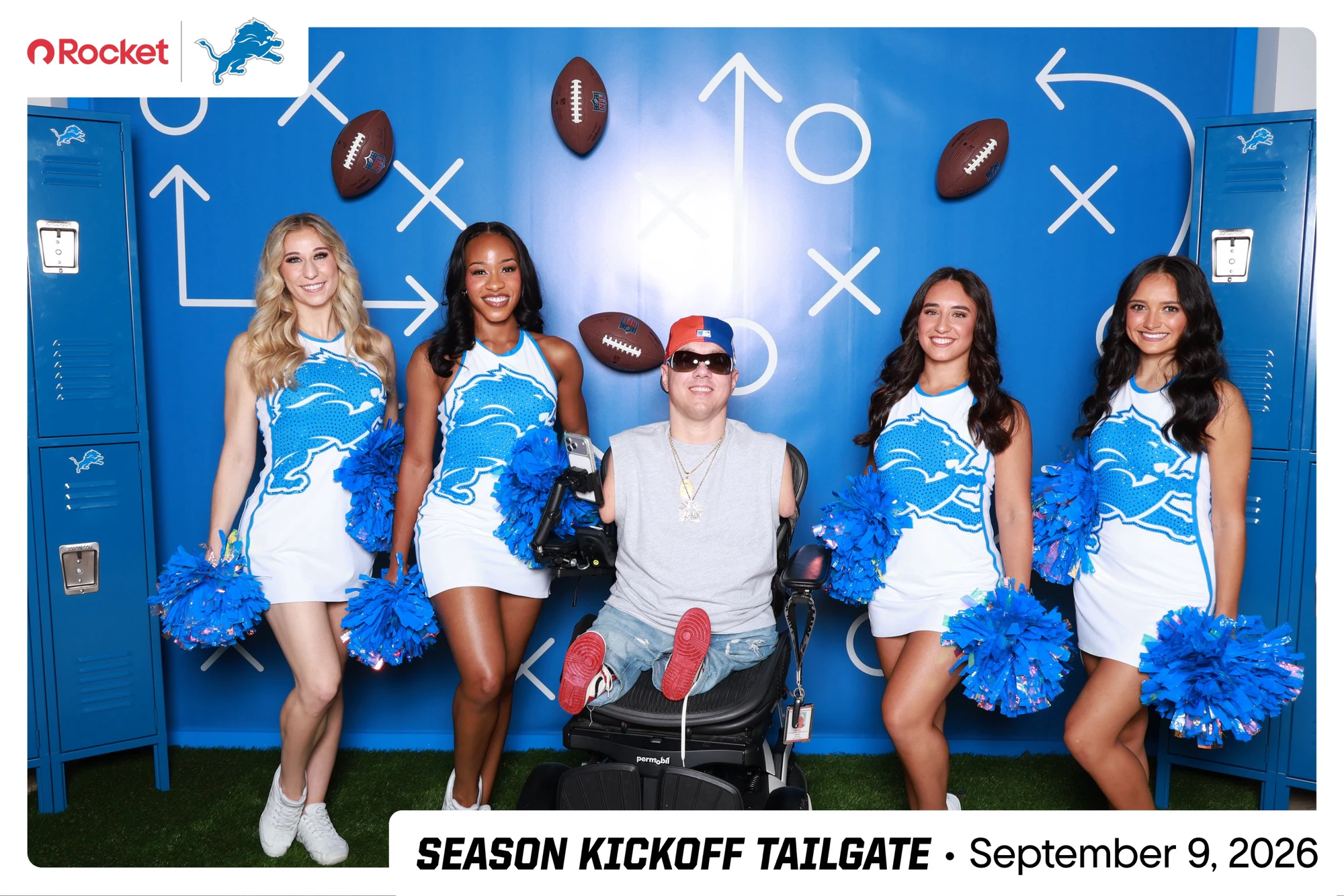 A guest in star glasses with five cheerleaders around him at Lions Season Launch Week
