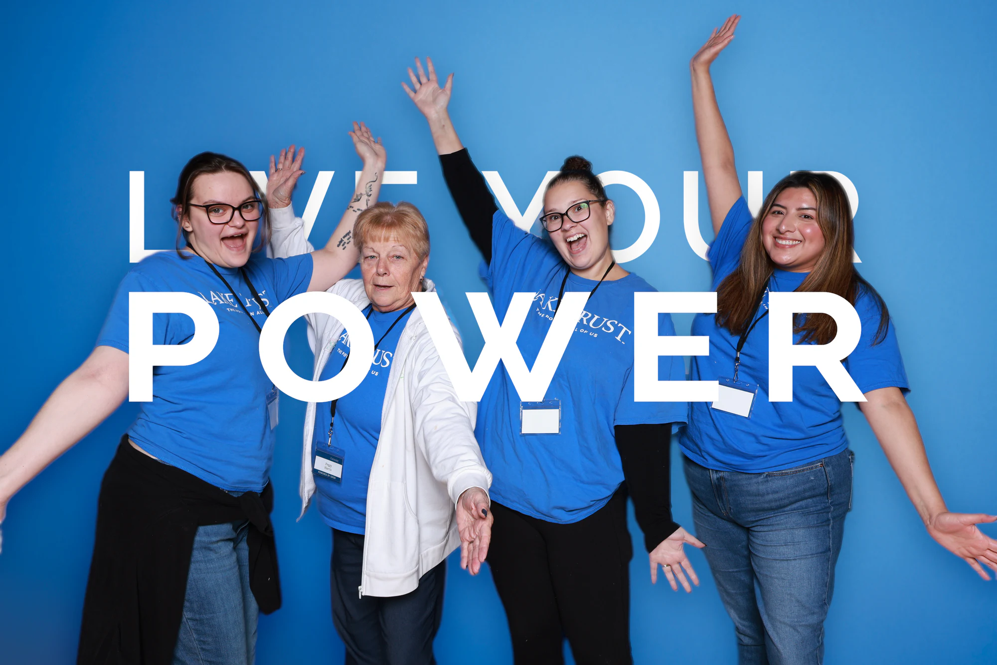 The four women with their arms thrown wide at Live Your Power