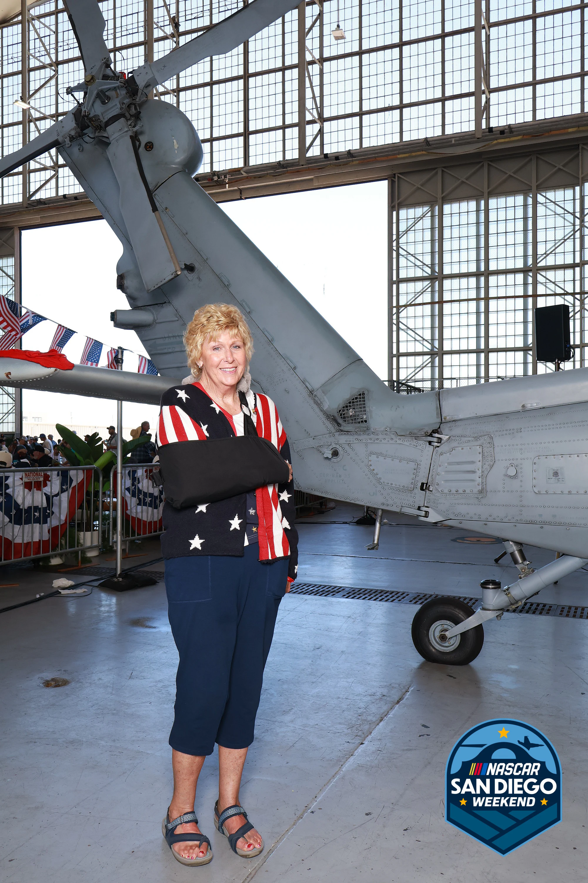 A guest in a stars-and-stripes jacket at NASCAR San Diego