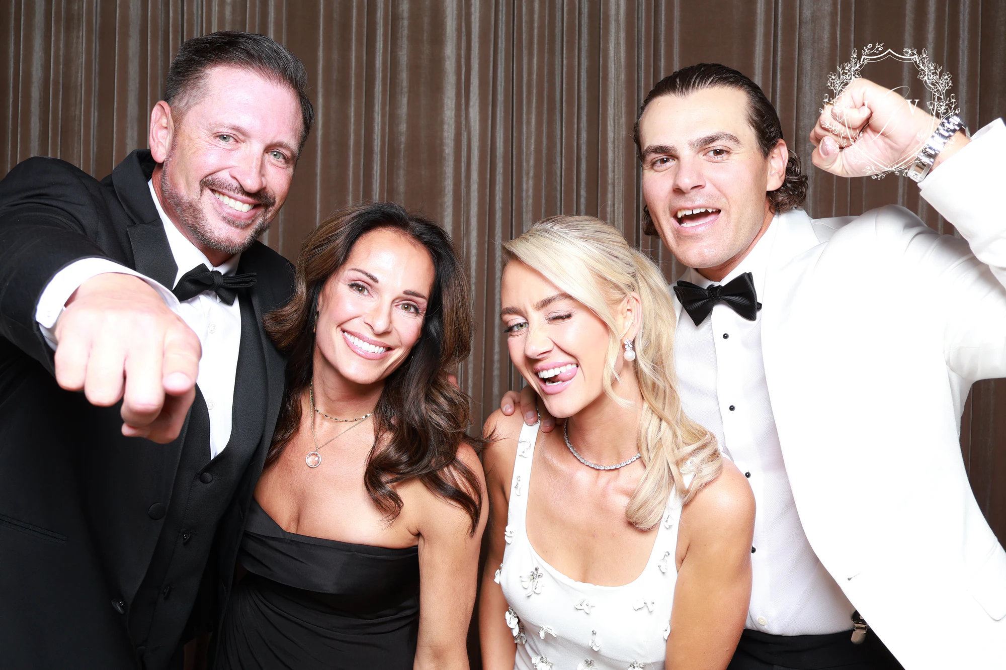 The two couples laughing, the man on the left pointing at the camera at Nash Gaurino Wedding