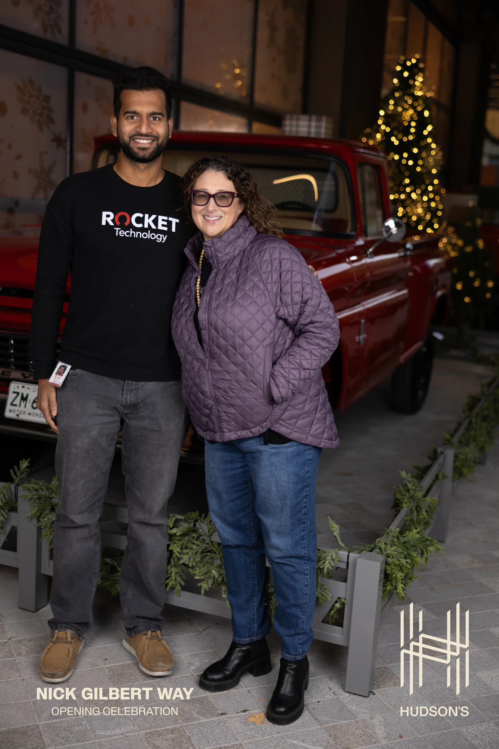 Couple in a Rocket Technology shirt at Nick Gilbert Way Opening Celebration