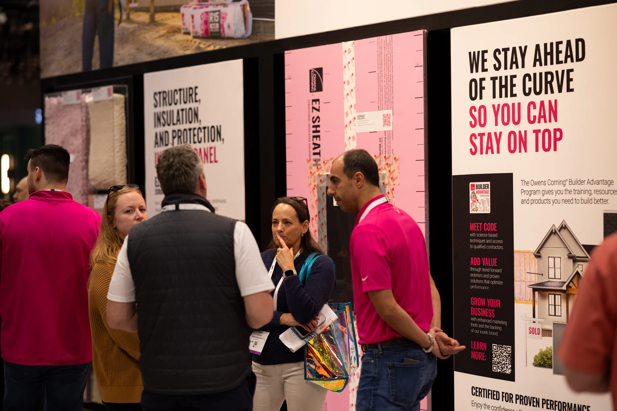 Rep and attendee at the EZ Sheathing wall at Owens Corning at IBS 2026