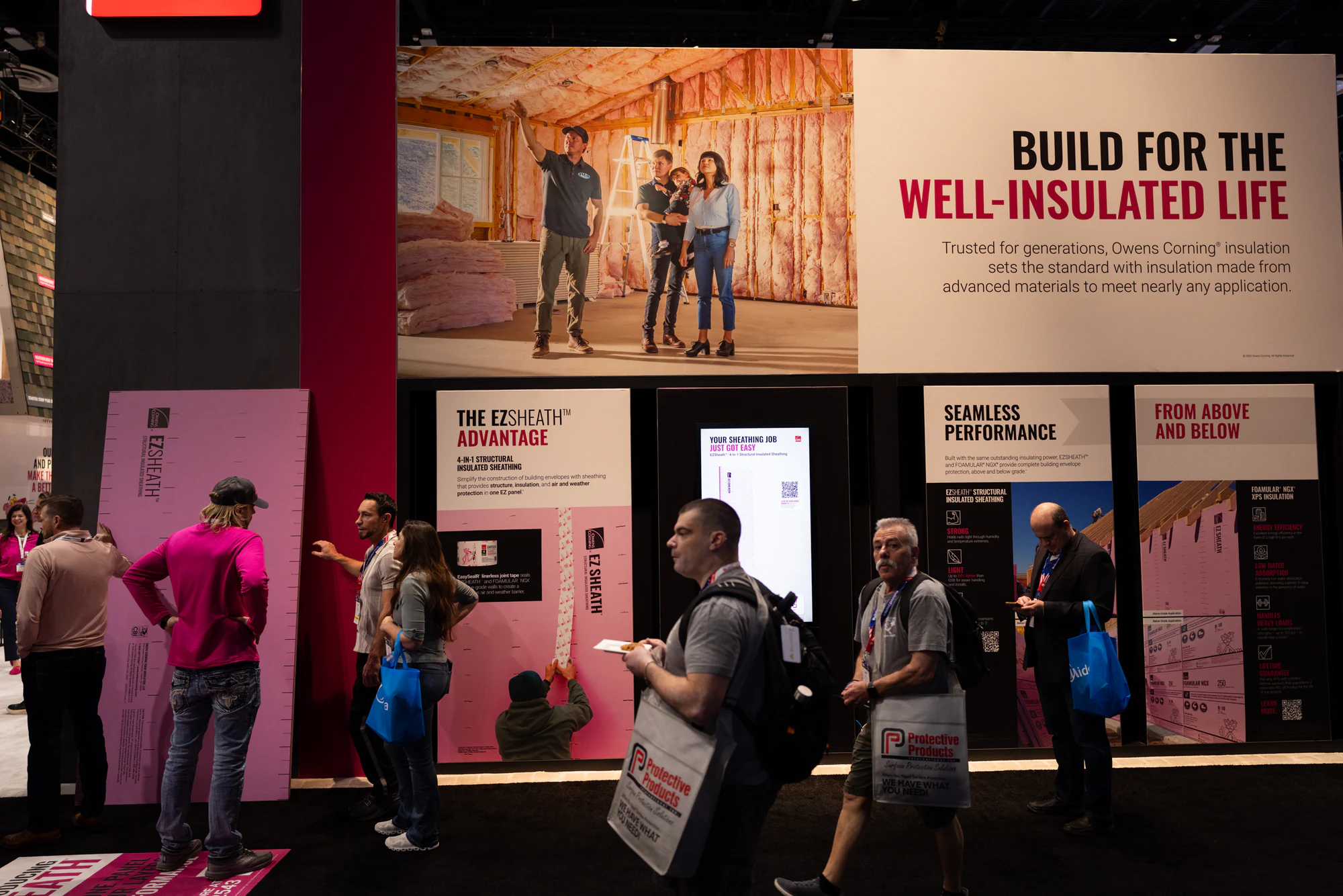 Build Well-Insulated wall with guests walking through it at Owens Corning at IBS 2026