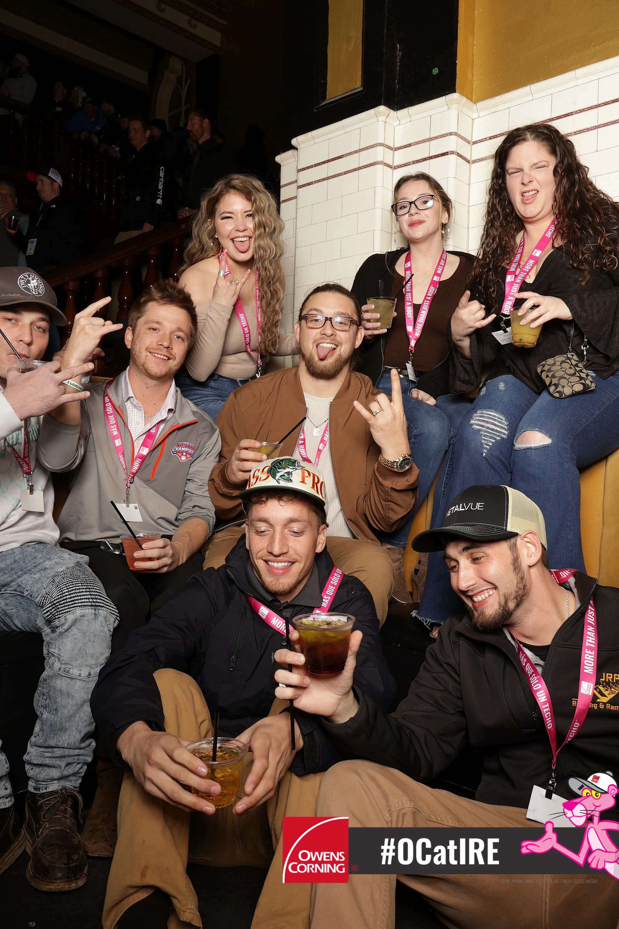 Six guests piled onto the bench at Owens Corning at IRE 2025