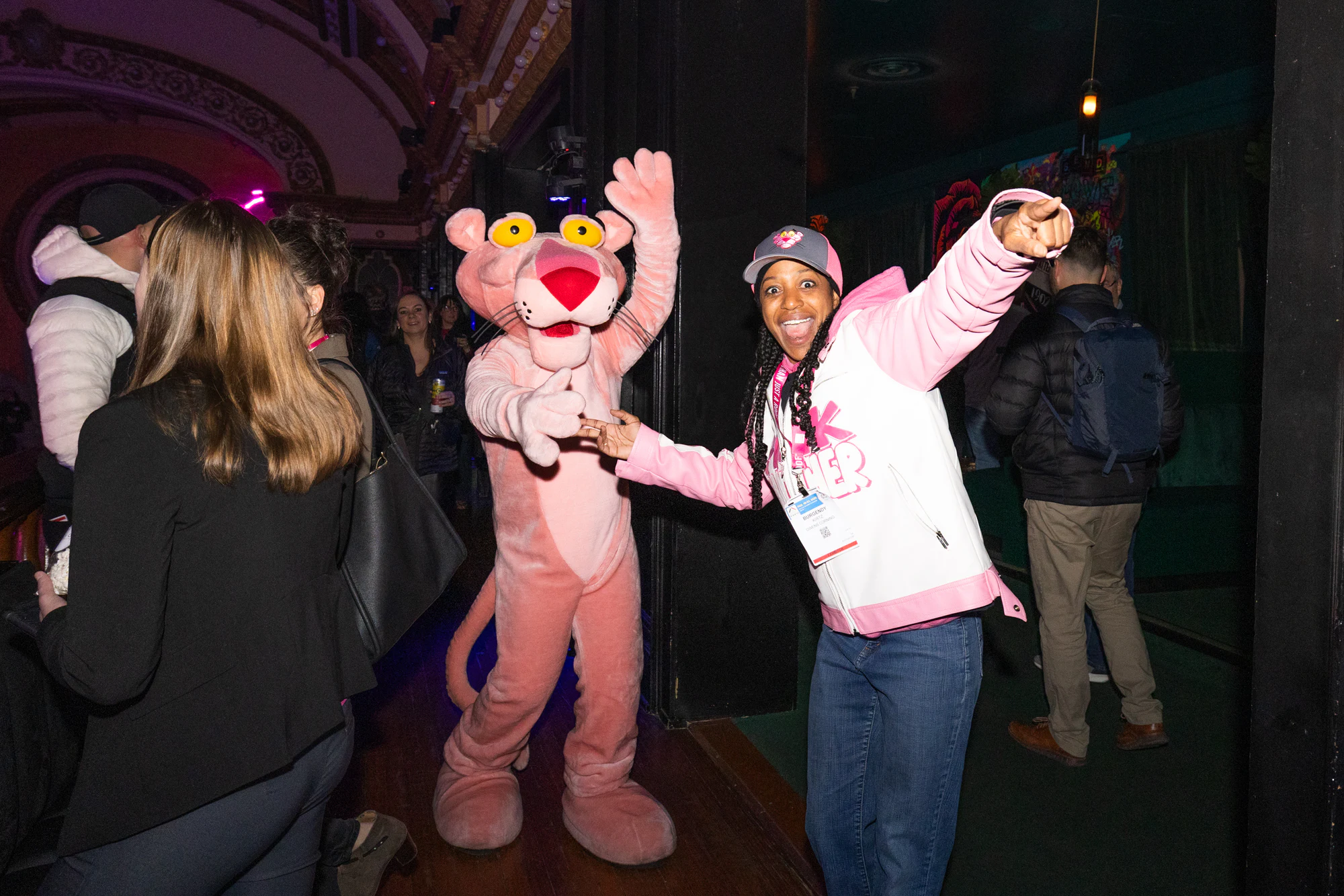 Pink Panther mascot dancing with guests at the contractor party at Owens Corning at IRE 2025