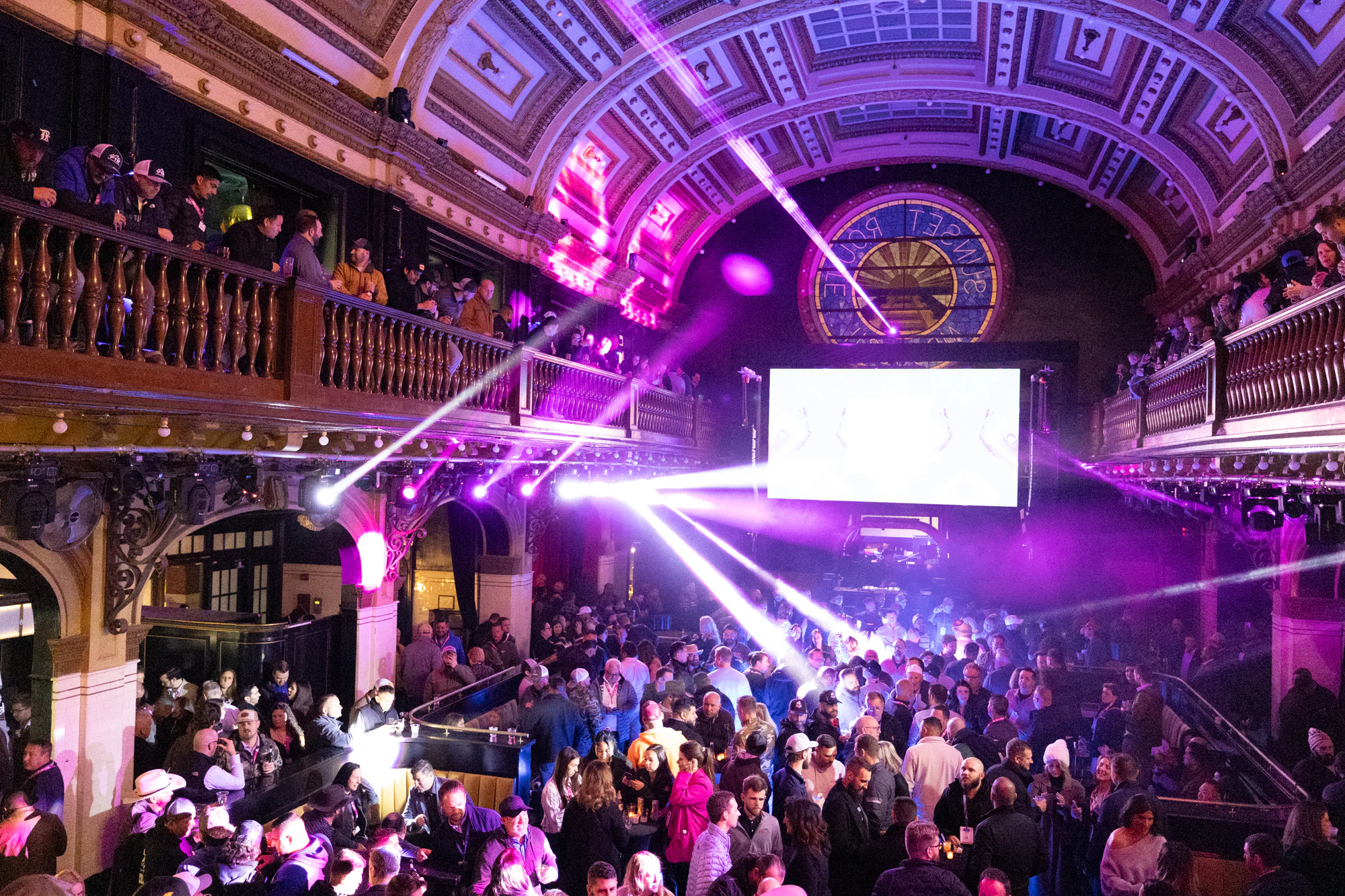 Second angle of the 1902 Venue hall with the lights on the crowd at Owens Corning at IRE 2025