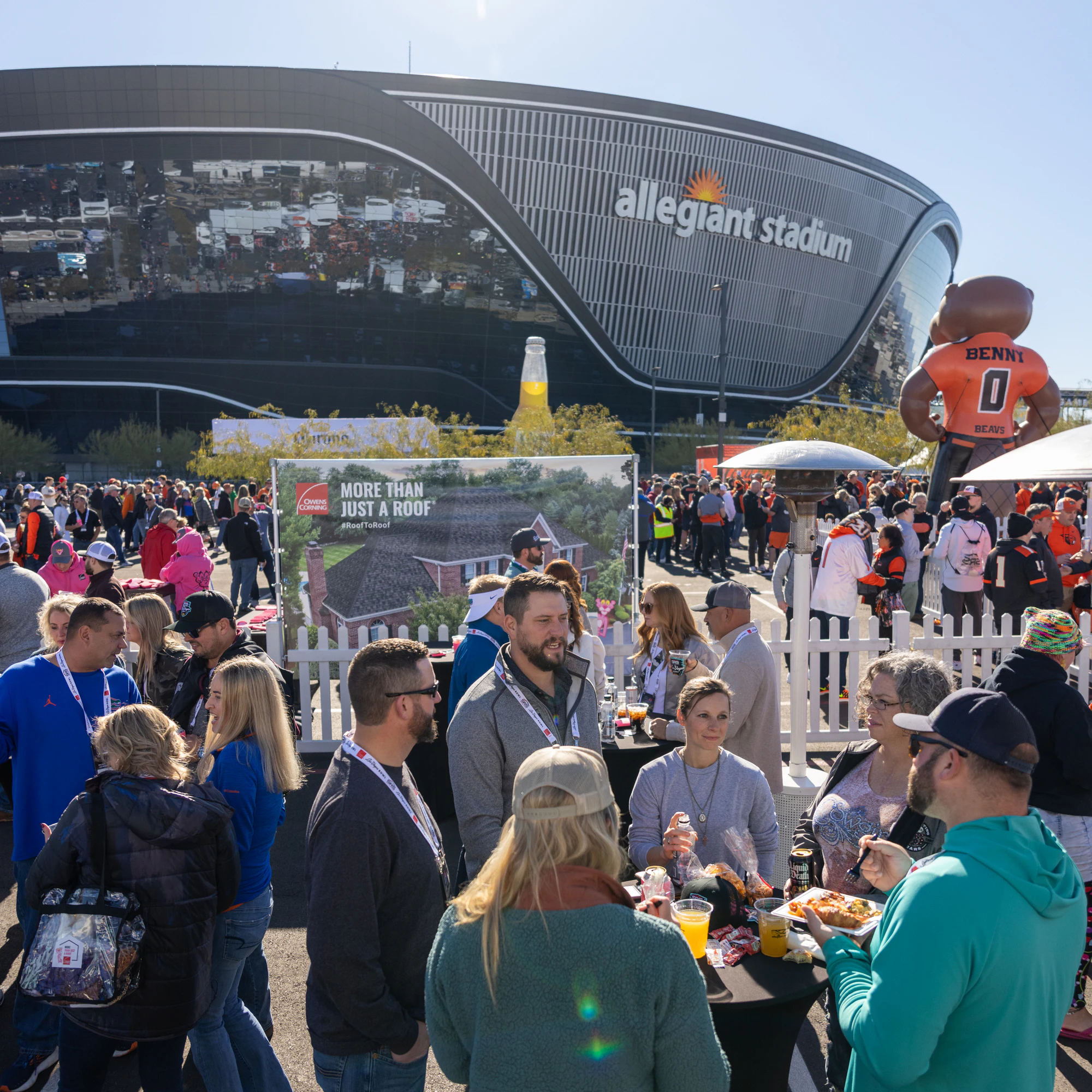 Tailgate hospitality crowd with Allegiant Stadium filling the skyline at Owens Corning at the 2022 Las Vegas Bowl