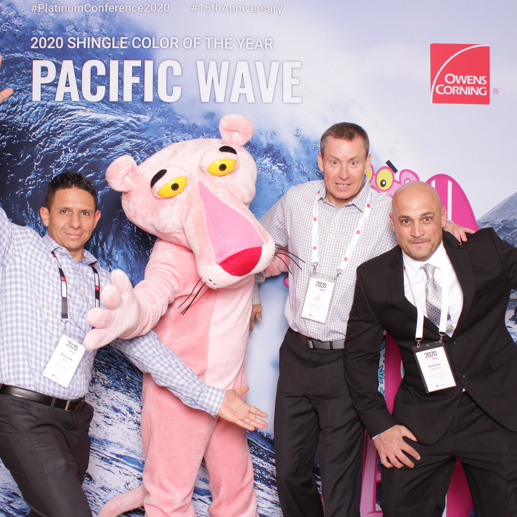 The three again, the Panther leaning in beside them at Owens Corning Platinum Conference