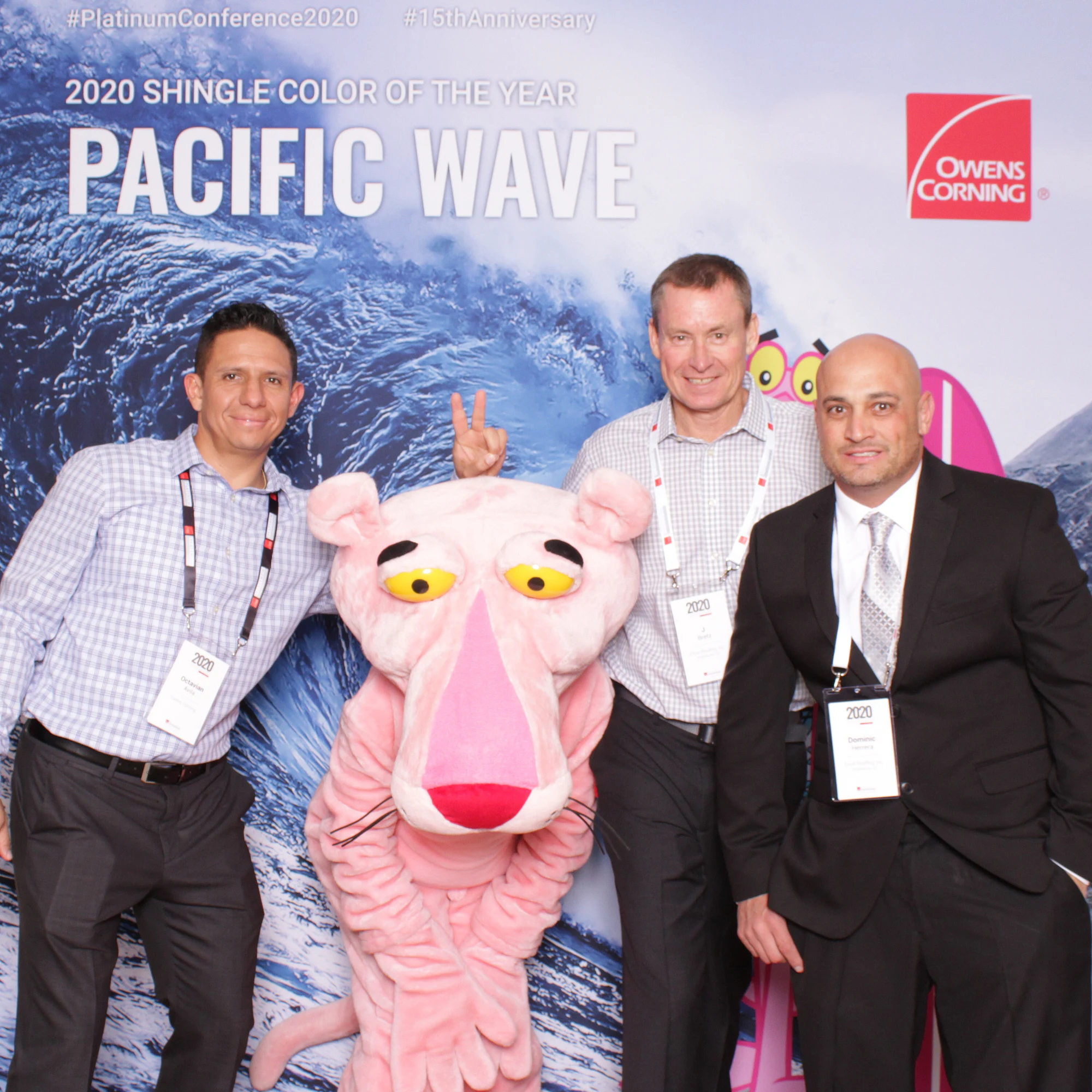 The three standing tall while the Panther ducks low between them at Owens Corning Platinum Conference