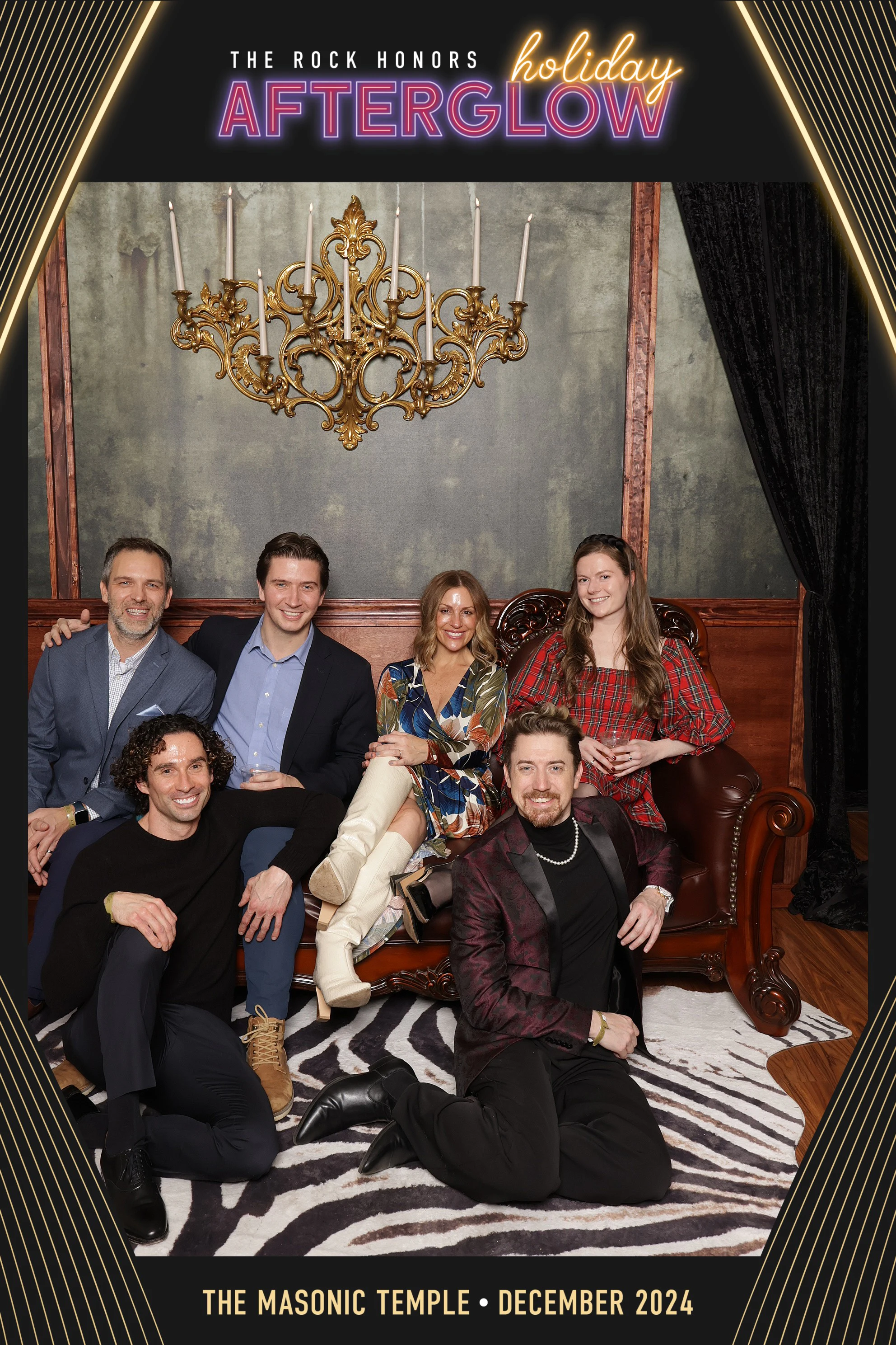 Seven around the settee at Rock Honors AfterGlow