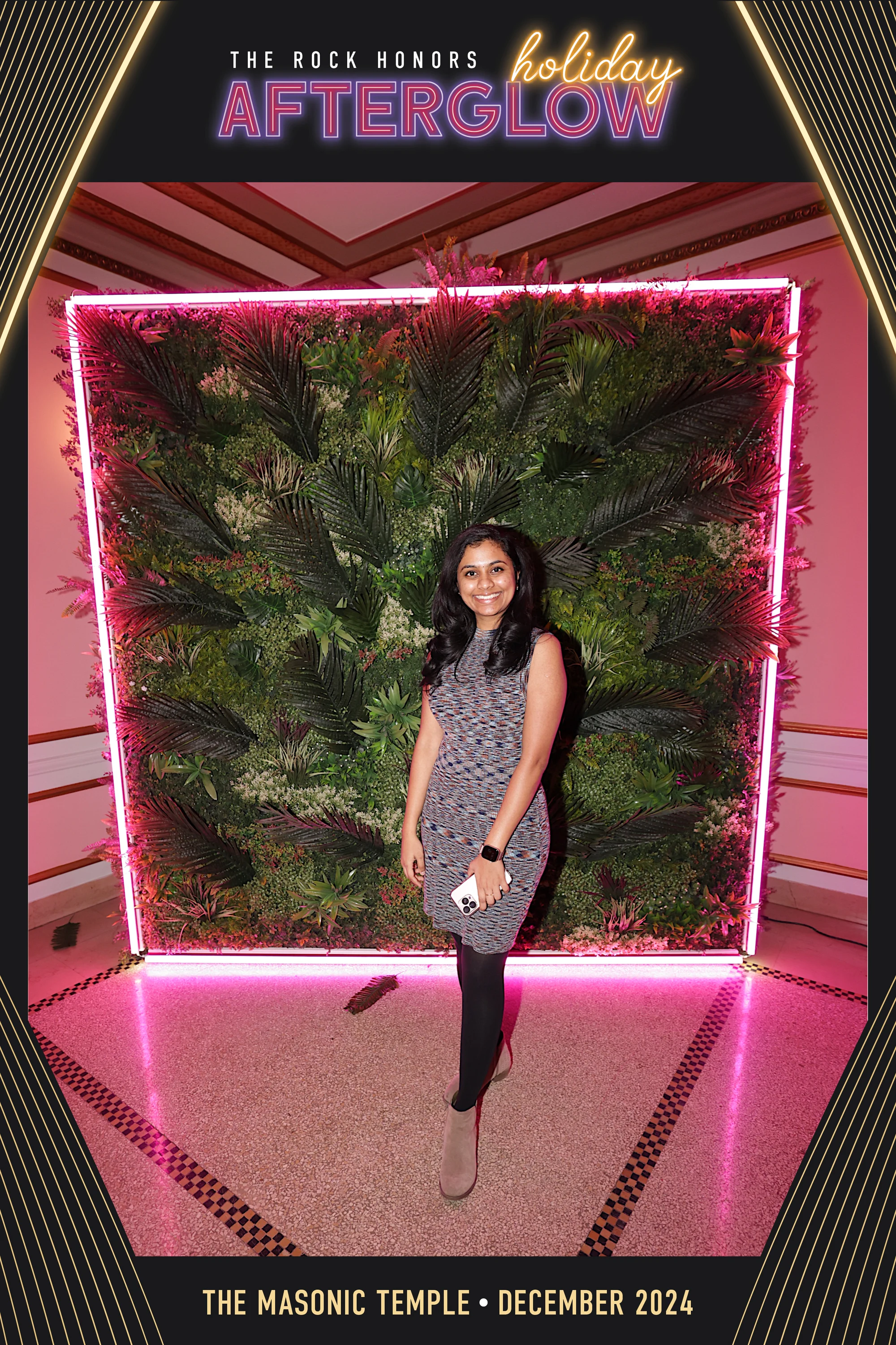 A guest at the neon tree wall at Rock Honors AfterGlow