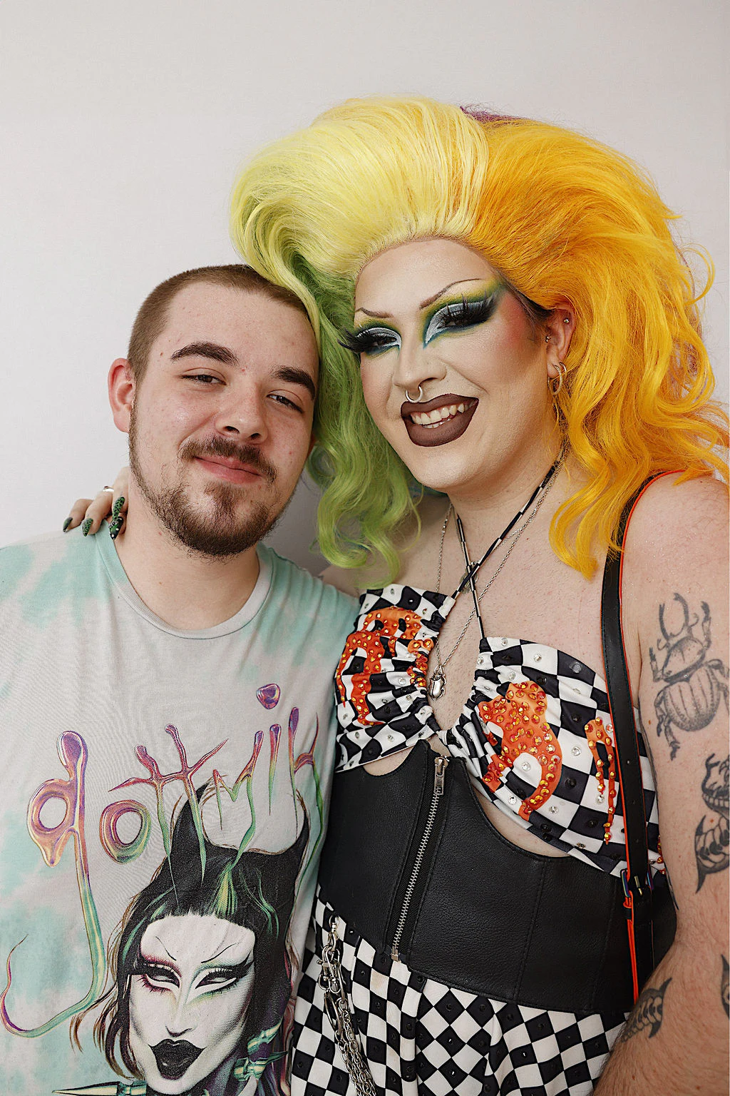 Friend with a drag queen in full color at My Chosen Family Portraits at Motor City Pride 2025