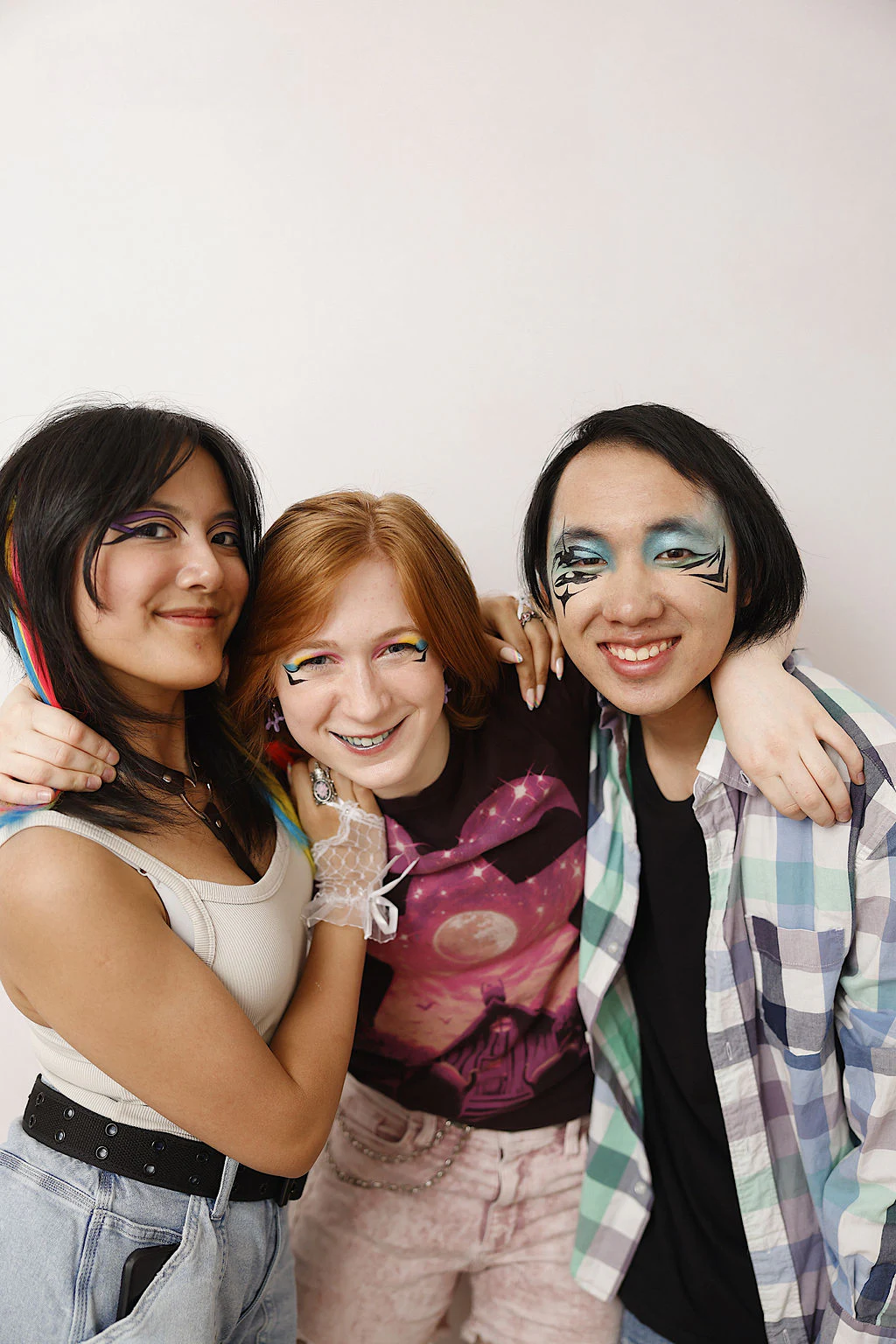 Three friends, glitter makeup at My Chosen Family Portraits at Motor City Pride 2025
