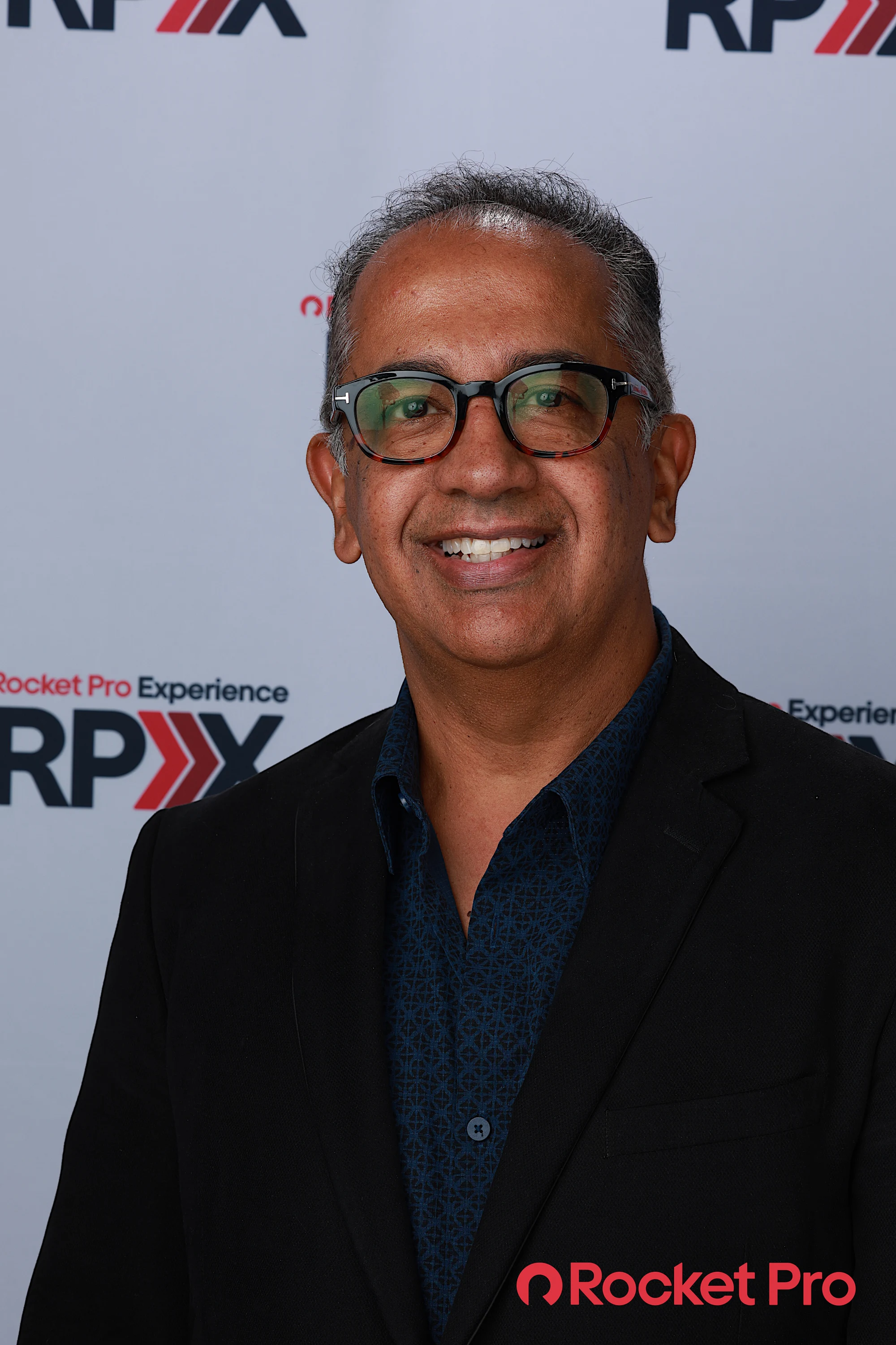 Half-length with the RPX logo over his shoulder at Rocket Pro Experience