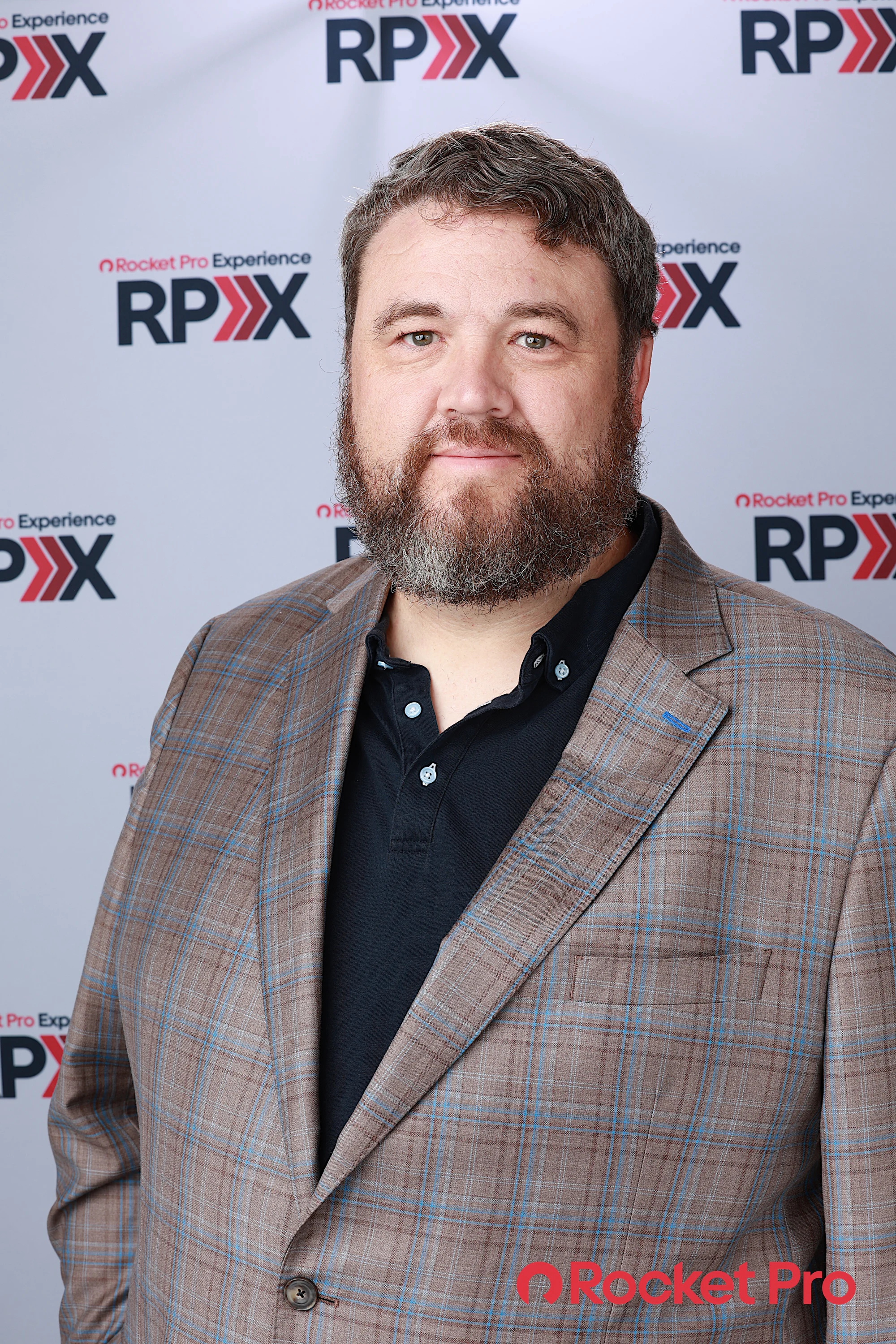 Squarer to camera, more formal at Rocket Pro Experience
