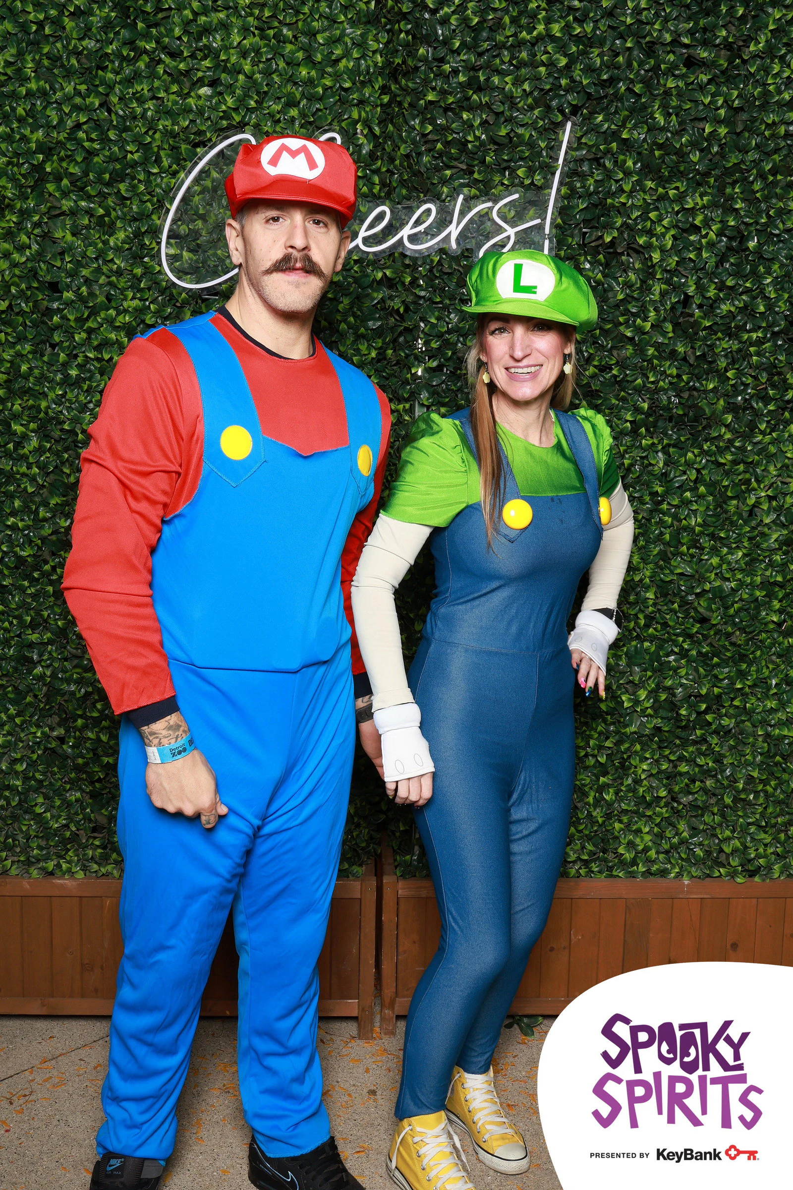 Mario and Luigi standing side by side, both smiling at Spooky Spirits at the Detroit Zoo 2026