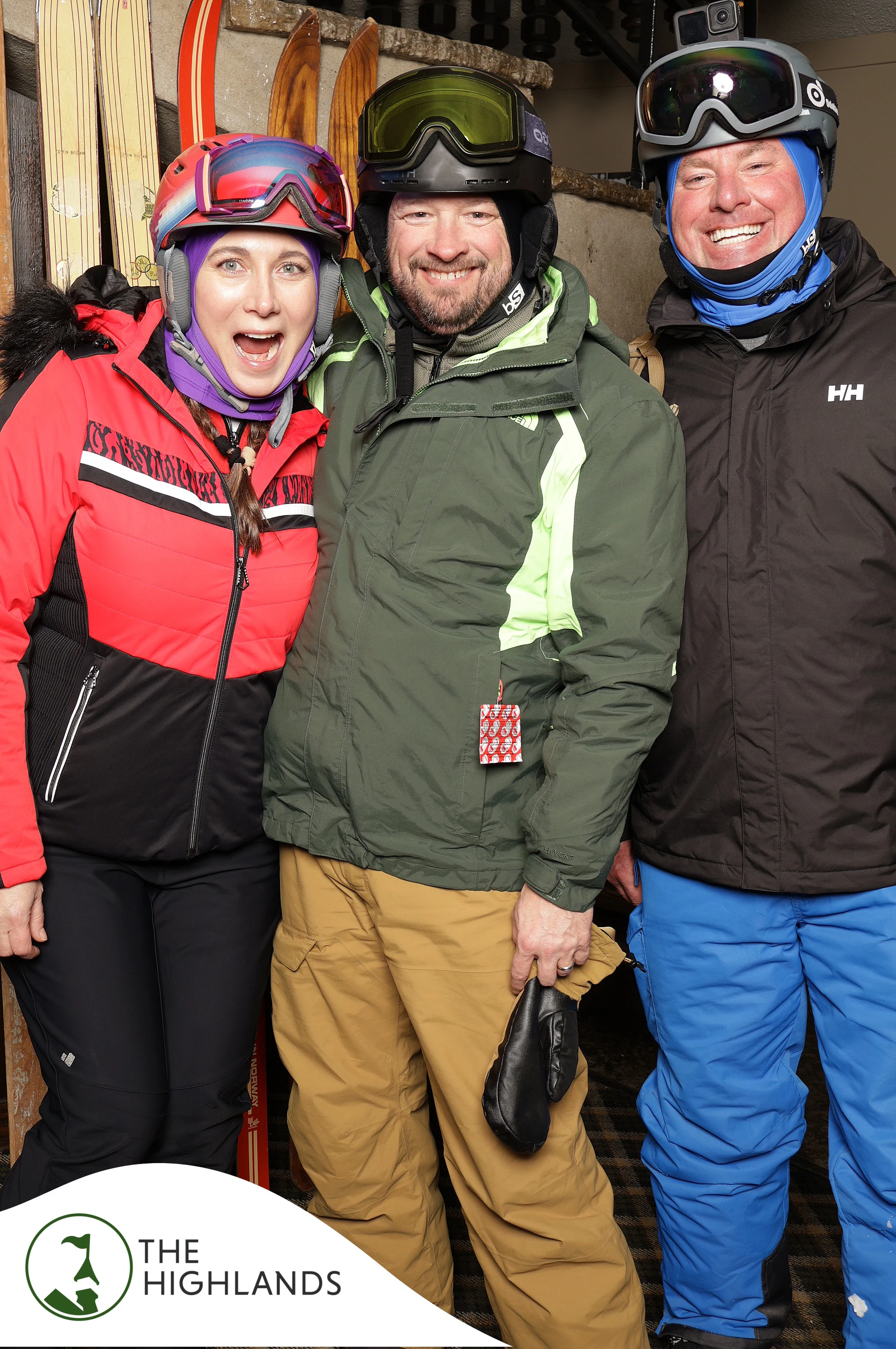 The three friends in helmets, the woman in red laughing at The Highlands 61st Anniversary