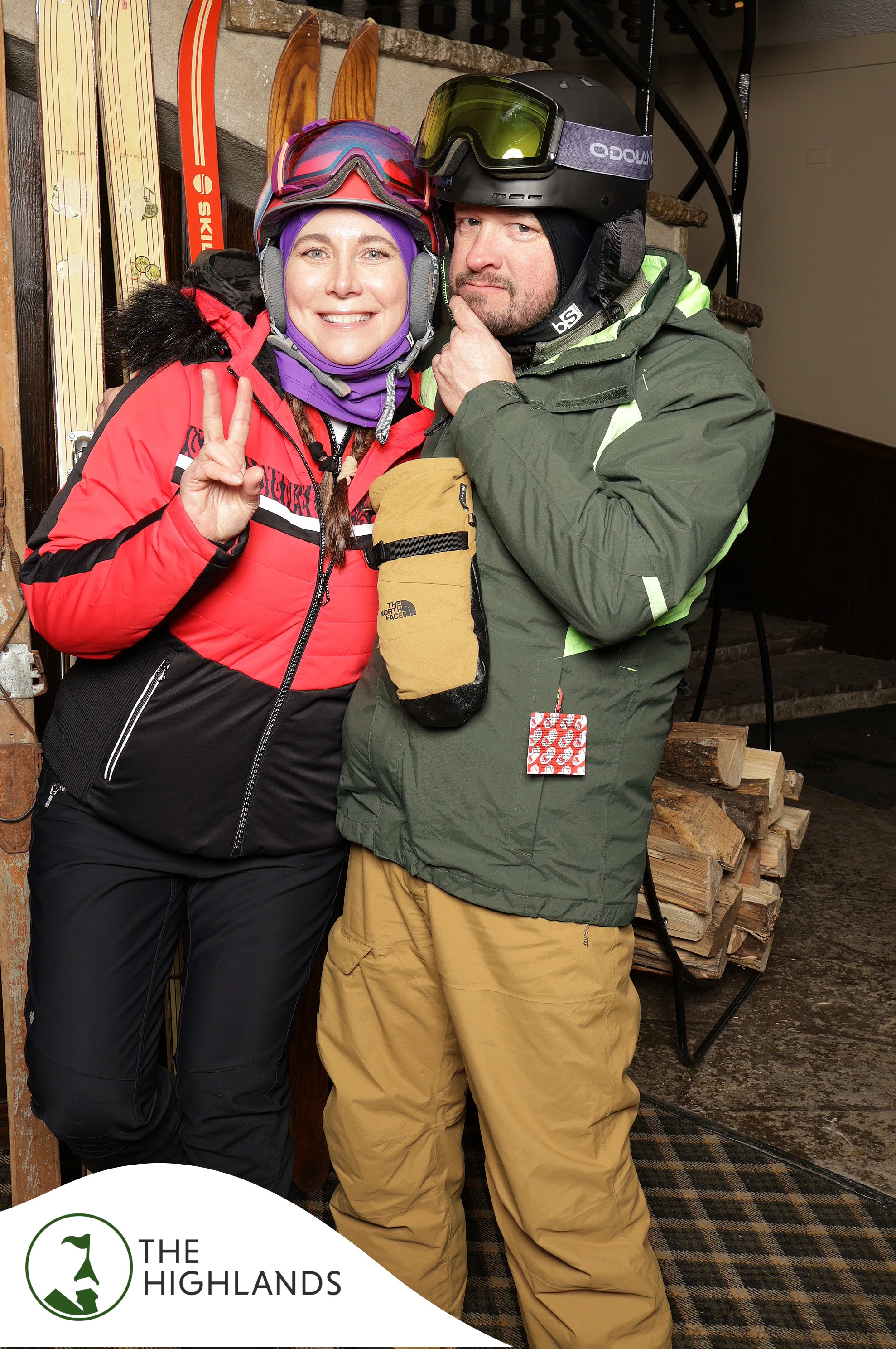 The woman in red throwing a peace sign beside her friend in green at The Highlands 61st Anniversary