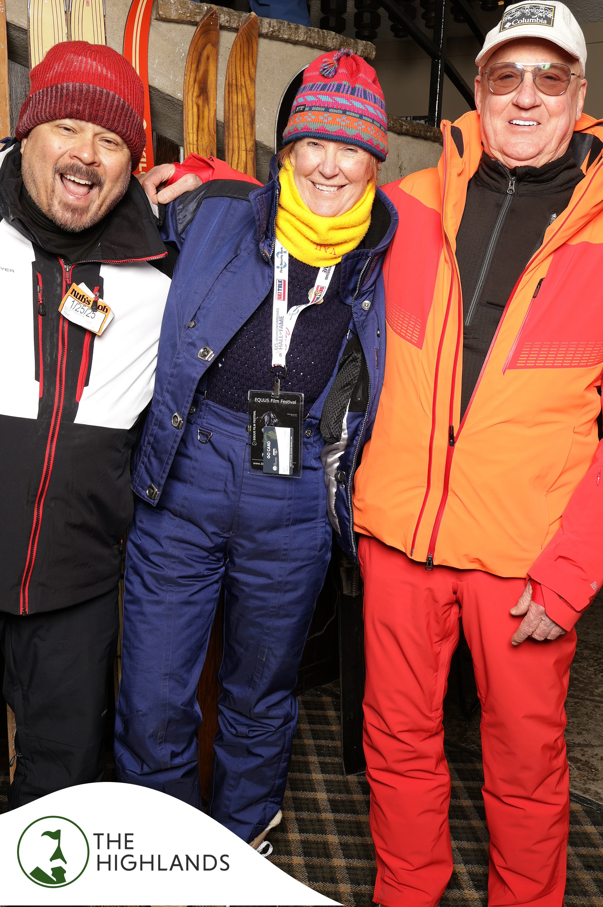 The three friends in ski gear, arms around each other at The Highlands 61st Anniversary