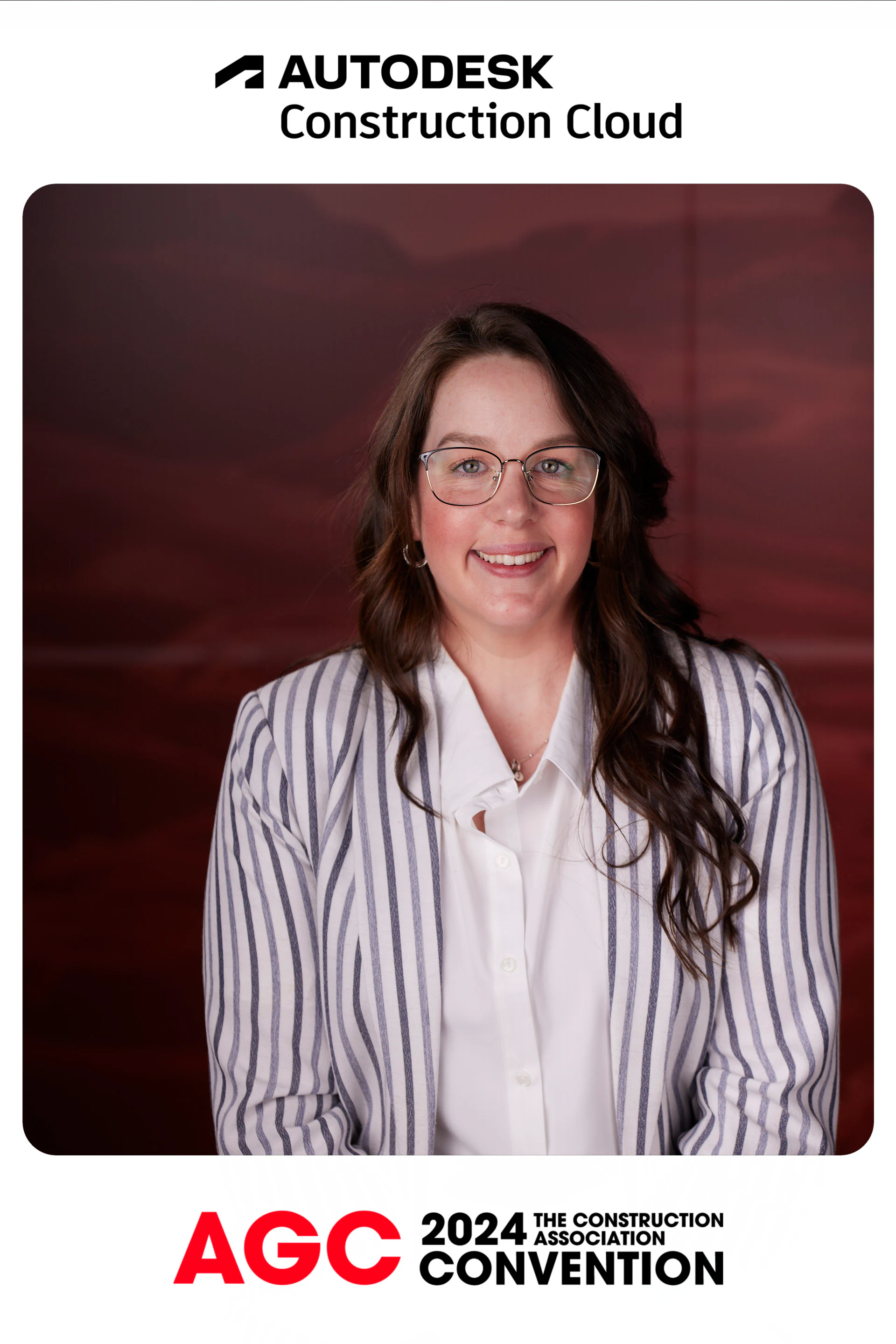Woman in a striped blazer, in Autodesk’s branded card at the AGC 2024 Convention